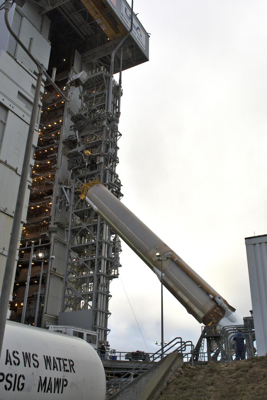 A crane lifts a United Launch Alliance Atlas V booster at Space Launch Complex 3 at Vandenberg Air Force Base in California. The rocket will launch NASA's Interior Exploration using Seismic Investigations, Geodesy and Heat Transport, or InSight, mission to land on Mars. InSight is the first mission to explore the Red Planet's deep interior. It will investigate processes that shaped the rocky planets of the inner solar system including Earth. Liftoff is scheduled for May 5, 2018.