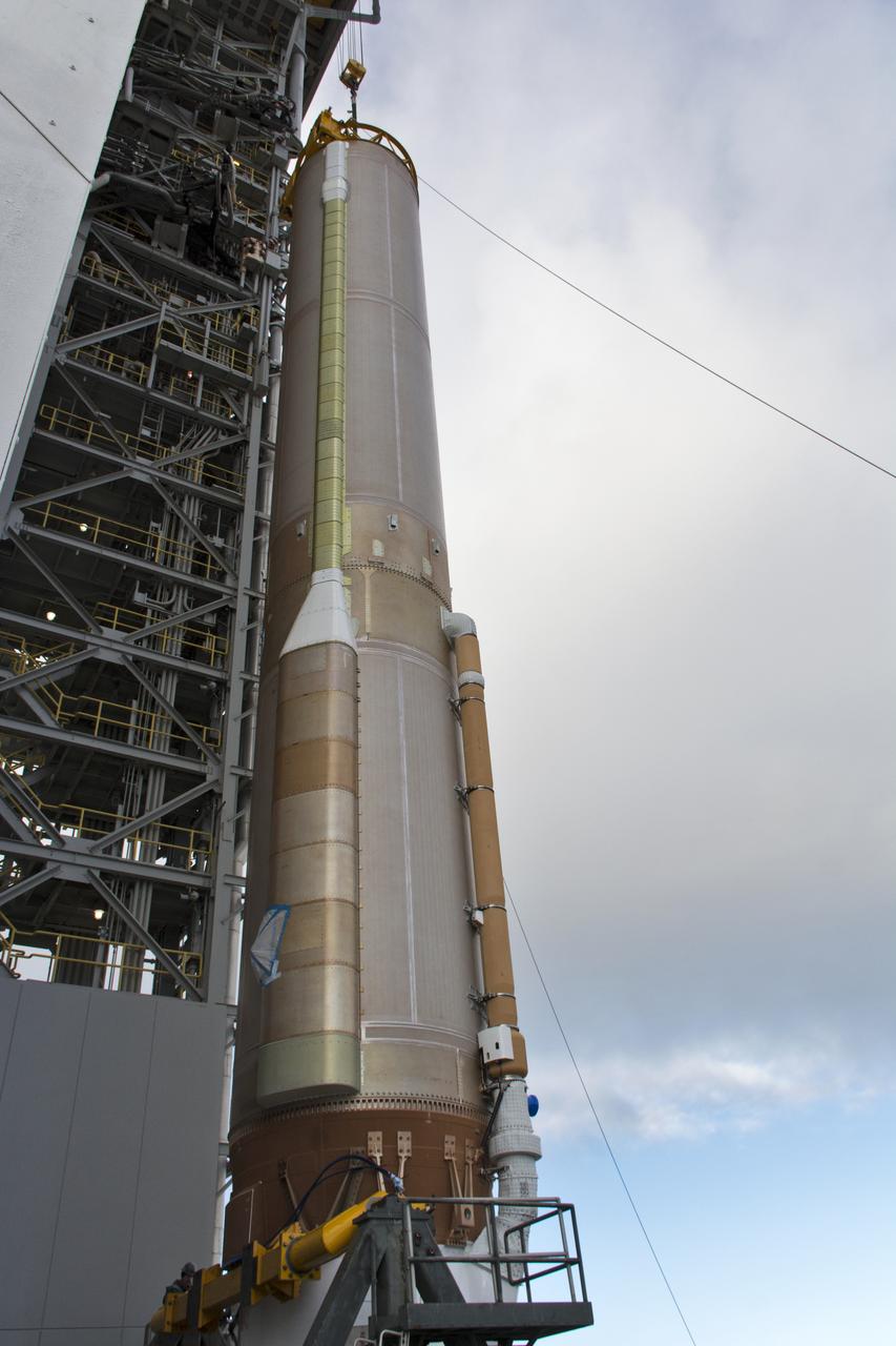 A crane lifts a United Launch Alliance Atlas V booster at Space Launch Complex 3 at Vandenberg Air Force Base in California. The rocket will launch NASA's Interior Exploration using Seismic Investigations, Geodesy and Heat Transport, or InSight, mission to land on Mars. InSight is the first mission to explore the Red Planet's deep interior. It will investigate processes that shaped the rocky planets of the inner solar system including Earth. Liftoff is scheduled for May 5, 2018.
