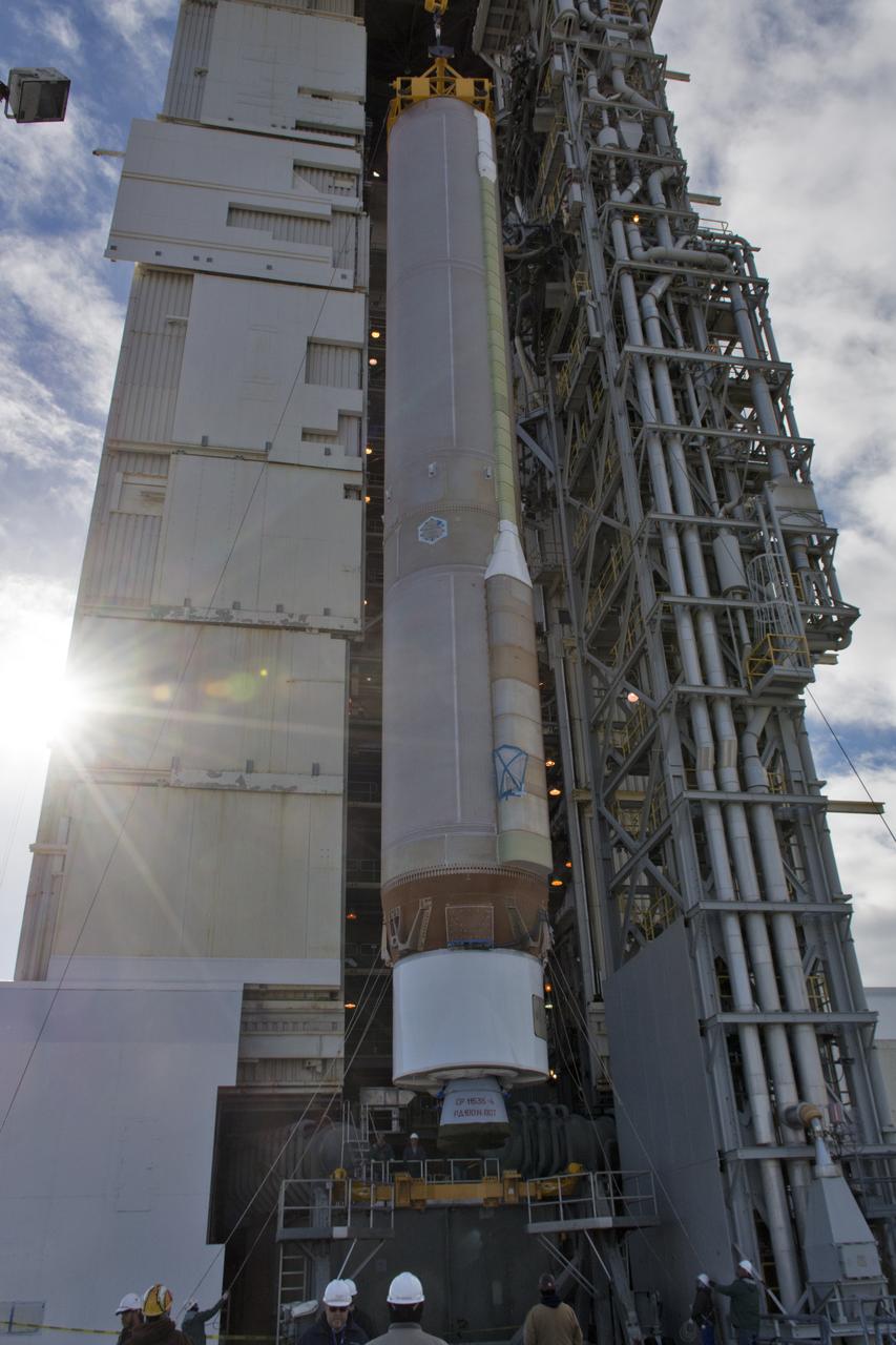 A crane lifts a United Launch Alliance Atlas V booster at Space Launch Complex 3 at Vandenberg Air Force Base in California. The rocket will launch NASA's Interior Exploration using Seismic Investigations, Geodesy and Heat Transport, or InSight, mission to land on Mars. InSight is the first mission to explore the Red Planet's deep interior. It will investigate processes that shaped the rocky planets of the inner solar system including Earth. Liftoff is scheduled for May 5, 2018.