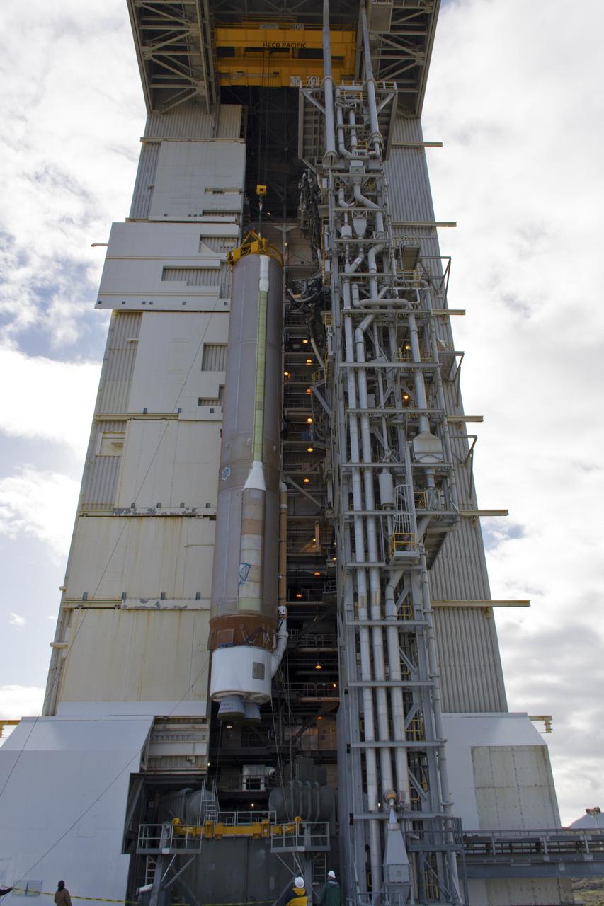 A crane lifts a United Launch Alliance Atlas V booster at Space Launch Complex 3 at Vandenberg Air Force Base in California. The rocket will launch NASA's Interior Exploration using Seismic Investigations, Geodesy and Heat Transport, or InSight, mission to land on Mars. InSight is the first mission to explore the Red Planet's deep interior. It will investigate processes that shaped the rocky planets of the inner solar system including Earth. Liftoff is scheduled for May 5, 2018.