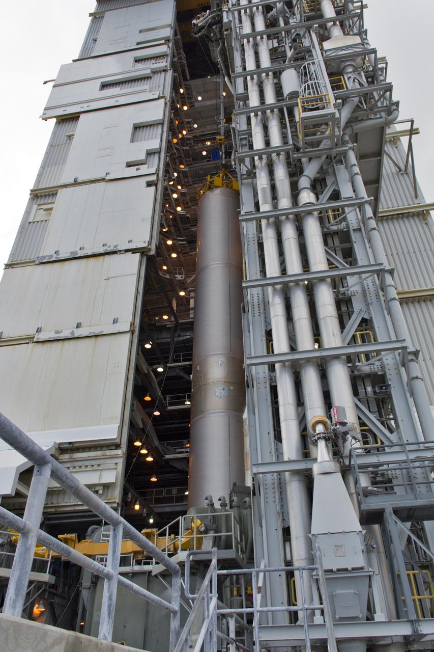 A crane positions a United Launch Alliance Atlas V booster on the launch pad at Space Launch Complex 3 at Vandenberg Air Force Base in California. The rocket will launch NASA's Interior Exploration using Seismic Investigations, Geodesy and Heat Transport, or InSight, mission to land on Mars. InSight is the first mission to explore the Red Planet's deep interior. It will investigate processes that shaped the rocky planets of the inner solar system including Earth. Liftoff is scheduled for May 5, 2018.