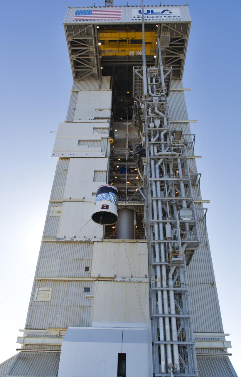 At Space Launch Complex 3 at Vandenberg Air Force Base in California, the aft stub adapter (ASA) and interstage adapter (ISA) for a United Launch Alliance (ULA) Atlas V are lifted by crane for mating atop a Centaur upper stage. The launch vehicle will send NASA's Interior Exploration using Seismic Investigations, Geodesy and Heat Transport, or InSight, spacecraft to land on Mars. InSight is the first mission to explore the Red Planet's deep interior. InSight is scheduled for liftoff May 5, 2018. InSight will be the first mission to look deep beneath the Martian surface. It will study the planet's interior by measuring its heat output and listen for marsquakes. InSight will use the seismic waves generated by marsquakes to develop a map of the planet’s deep interior. The resulting insight into Mars’ formation will provide a better understanding of how other rocky planets, including Earth, were created. NASA’s Jet Propulsion Laboratory in Pasadena, California, manages the InSight mission for the agency’s Science Mission Directorate. InSight is part of NASA's Discovery Program, managed by its Marshall Space Flight Center in Huntsville, Alabama. The spacecraft, including cruise stage and lander, was built and tested by Lockheed Martin Space in Denver. Several European partners, including France's space agency, the Centre National d'Étude Spatiales, and the German Aerospace Center, are supporting the mission. United Launch Alliance of Centennial, Colorado, is providing the Atlas V launch service. NASA’s Launch Services Program, based at its Kennedy Space Center in Florida, is responsible for launch management.
