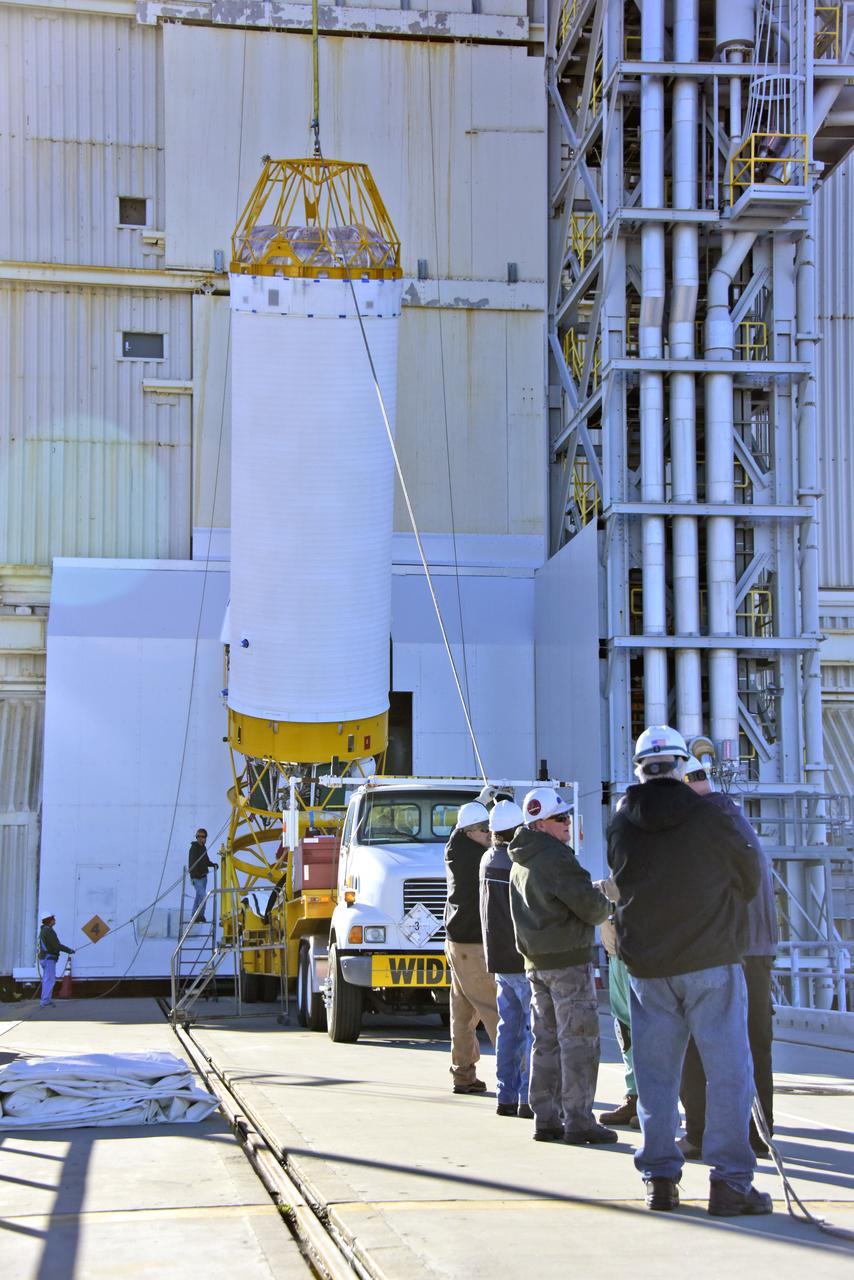 At Space Launch Complex 3 at Vandenberg Air Force Base in California a crane lifts a United Launch Alliance Centaur upper stage for mating atop an Atlas V booster. The rocket will launch NASA's Interior Exploration using Seismic Investigations, Geodesy and Heat Transport, or InSight, mission to land on Mars. InSight is the first mission to explore the Red Planet's deep interior. It will investigate processes that shaped the rocky planets of the inner solar system including Earth. Liftoff is scheduled for May 5, 2018.