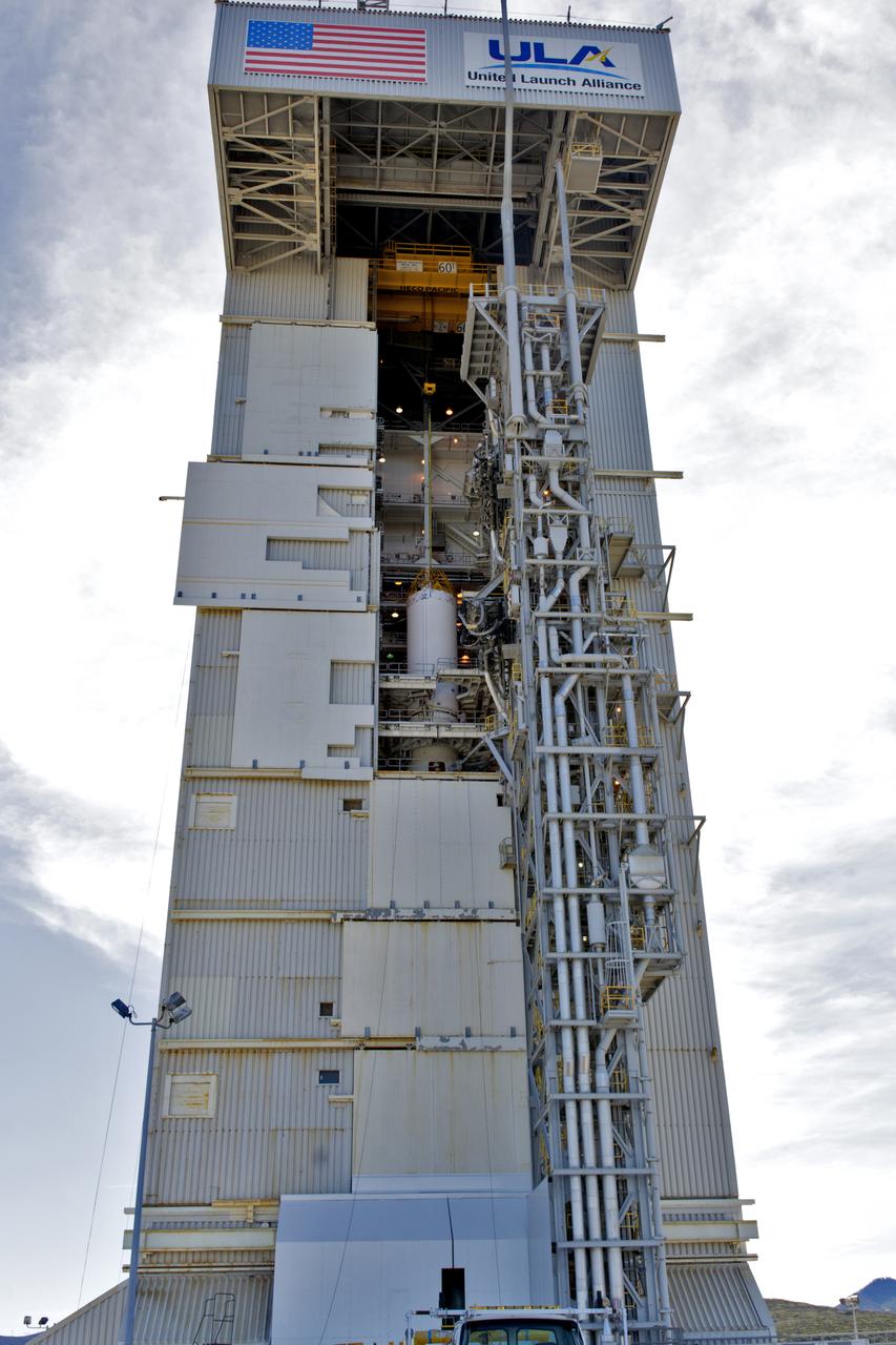 At Space Launch Complex 3 at Vandenberg Air Force Base in California a crane lifts a United Launch Alliance Centaur upper stage for mating atop an Atlas V booster. The rocket will launch NASA's Interior Exploration using Seismic Investigations, Geodesy and Heat Transport, or InSight, mission to land on Mars. InSight is the first mission to explore the Red Planet's deep interior. It will investigate processes that shaped the rocky planets of the inner solar system including Earth. Liftoff is scheduled for May 5, 2018.
