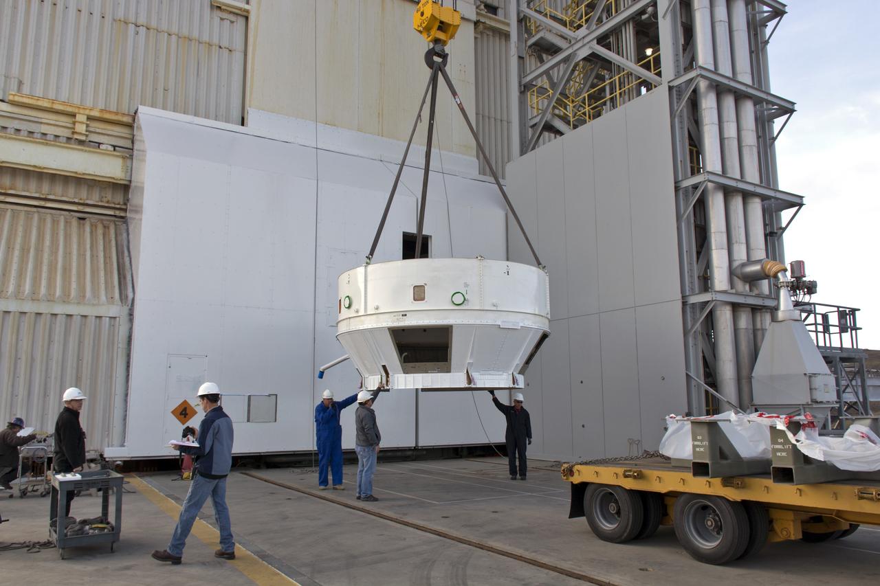 At Space Launch Complex 3 at Vandenberg Air Force Base in California, a boattail fairing is lifted by a crane for mating atop a United Launch Alliance (ULA) Centaur upper stage. The boattail is an adaptor providing an interface between the Centaur and the payload fairing encapsulating NASA's Interior Exploration using Seismic Investigations, Geodesy and Heat Transport, or InSight, spacecraft. A ULA Atlas V rocket is scheduled to liftoff on May 5, 2018, launching InSight the first mission to explore the deep interior of Mars. It will investigate processes that shaped the rocky planets of the inner solar system including Earth.