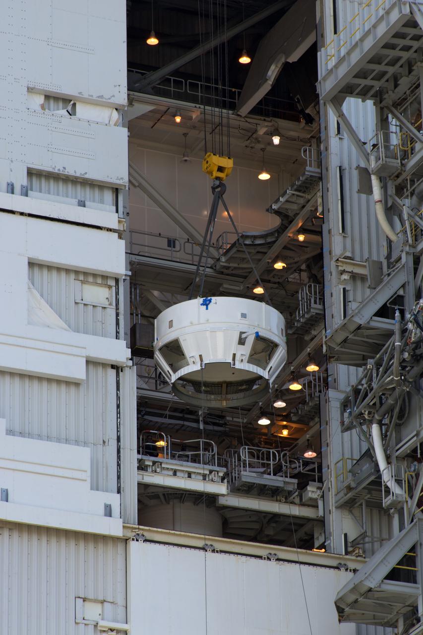 At Space Launch Complex 3 at Vandenberg Air Force Base in California, a boattail fairing is lifted by a crane for mating atop a United Launch Alliance (ULA) Centaur upper stage. The boattail is an adaptor providing an interface between the Centaur and the payload fairing encapsulating NASA's Interior Exploration using Seismic Investigations, Geodesy and Heat Transport, or InSight, spacecraft. A ULA Atlas V rocket is scheduled to liftoff on May 5, 2018, launching InSight the first mission to explore the deep interior of Mars. It will investigate processes that shaped the rocky planets of the inner solar system including Earth.