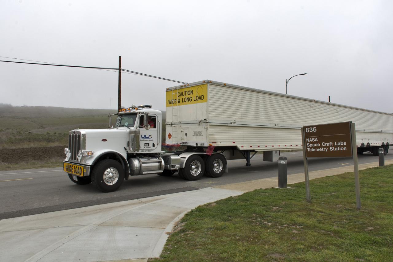 A United Launch Alliance Delta II booster arrives at NASA's Building 836, the Spacecraft Labs Telemetry Station at Vandenberg Air Force Base in California. It will be offloaded and begin preliminary checkouts and preflight processing for launch of the agency's Ice, Cloud and land Elevation Satellite-2, or ICESat-2. Liftoff from Space Launch Complex-2 at Vandenberg is scheduled for Sept. 12, 2018, and will be the last for the venerable Delta II rocket. Once in orbit, the satellite is designed to measure the height of a changing Earth, one laser pulse at a time, 10,000 laser pulses a second. The satellite will carry a single instrument, the Advanced Topographic Laser Altimeter System. ICESat-2 will help scientists investigate why, and how much, Earth's frozen and icy areas are changing. These area make up Earth's the cryosphere.