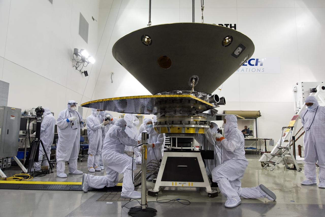 In the Astrotech facility at Vandenberg Air Force Base in California, NASA's Interior Exploration using Seismic Investigations, Geodesy and Heat Transport, or InSight, spacecraft is placed on a spin table during preflight processing. InSight will be the first mission to look deep beneath the Martian surface. It will study the planet's interior by measuring its heat output and listen for marsquakes. The spacecraft will use the seismic waves generated by marsquakes to develop a map of the planet’s deep interior. The resulting insight into Mars’ formation will provide a better understanding of how other rocky planets, including Earth, were created. InSight is scheduled for liftoff May 5, 2018.
