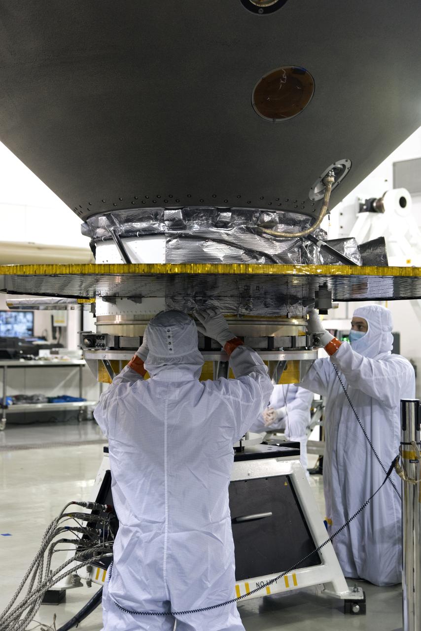 In the Astrotech facility at Vandenberg Air Force Base in California, NASA's Interior Exploration using Seismic Investigations, Geodesy and Heat Transport, or InSight, spacecraft is placed on a spin table during preflight processing. InSight will be the first mission to look deep beneath the Martian surface. It will study the planet's interior by measuring its heat output and listen for marsquakes. The spacecraft will use the seismic waves generated by marsquakes to develop a map of the planet’s deep interior. The resulting insight into Mars’ formation will provide a better understanding of how other rocky planets, including Earth, were created. InSight is scheduled for liftoff May 5, 2018.