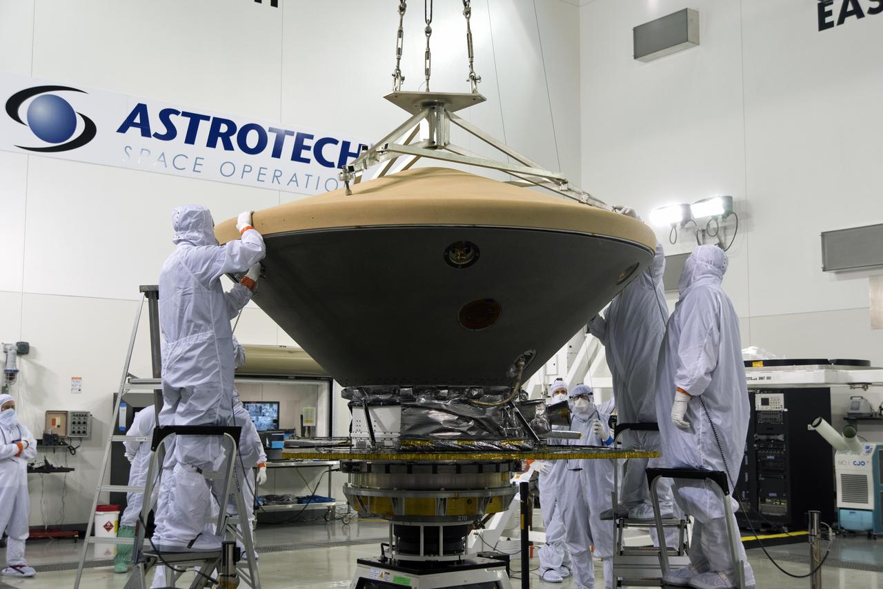 In the Astrotech facility at Vandenberg Air Force Base in California, the heatshield is placed on NASA's Interior Exploration using Seismic Investigations, Geodesy and Heat Transport, or InSight, Mars lander. InSight will be the first mission to look deep beneath the Martian surface. It will study the planet's interior by measuring its heat output and listen for marsquakes. The spacecraft will use the seismic waves generated by marsquakes to develop a map of the planet’s deep interior. The resulting insight into Mars’ formation will provide a better understanding of how other rocky planets, including Earth, were created. InSight is scheduled for liftoff May 5, 2018.