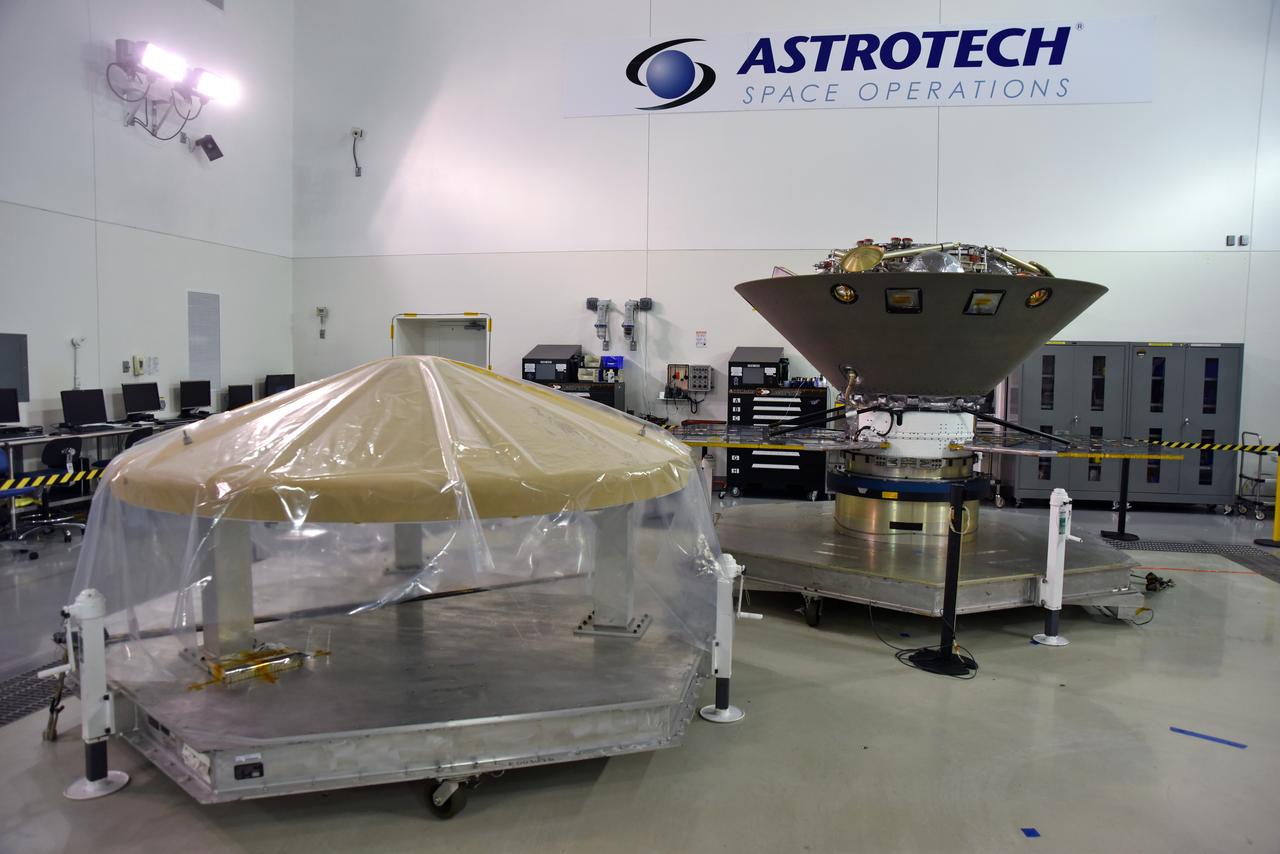 NASA's Interior Exploration using Seismic Investigations, Geodesy and Heat Transport, or InSight, is in a clean room inside the Astrotech processing facility at Vandenberg Air Force Base in California. The spacecraft's protective heat shield is in view at left. InSight is scheduled for liftoff on a United Launch Alliance Atlas V rocket May 5, 2018. InSight will be the first mission to look deep beneath the Martian surface. It will study the planet's interior by measuring its heat output and listen for marsquakes. InSight will use the seismic waves generated by marsquakes to develop a map of the planet’s deep interior. The resulting insight into Mars’ formation will provide a better understanding of how other rocky planets, including Earth, were created. NASA’s Jet Propulsion Laboratory in Pasadena, California, manages the InSight mission for the agency’s Science Mission Directorate. InSight is part of NASA's Discovery Program, managed by its Marshall Space Flight Center in Huntsville, Alabama. The spacecraft, including cruise stage and lander, was built and tested by Lockheed Martin Space in Denver. Several European partners, including France's space agency, the Centre National d'Étude Spatiales, and the German Aerospace Center, are supporting the mission. United Launch Alliance of Centennial, Colorado, is providing the Atlas V launch service. NASA’s Launch Services Program, based at its Kennedy Space Center in Florida, is responsible for launch management.