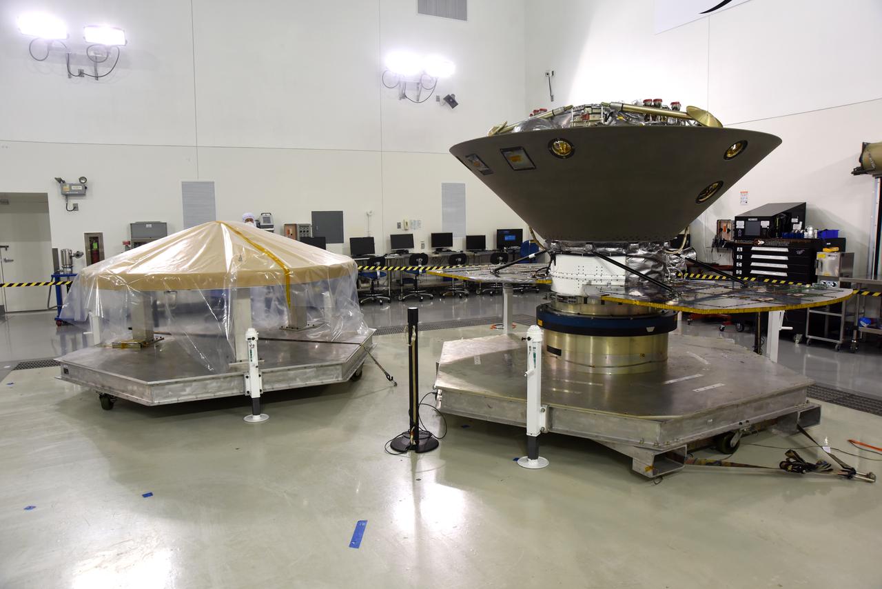 NASA's Interior Exploration using Seismic Investigations, Geodesy and Heat Transport, or InSight, is in a clean room inside the Astrotech processing facility at Vandenberg Air Force Base in California. The spacecraft's protective heat shield is in view at left. InSight is scheduled for liftoff on a United Launch Alliance Atlas V rocket May 5, 2018. InSight will be the first mission to look deep beneath the Martian surface. It will study the planet's interior by measuring its heat output and listen for marsquakes. InSight will use the seismic waves generated by marsquakes to develop a map of the planet’s deep interior. The resulting insight into Mars’ formation will provide a better understanding of how other rocky planets, including Earth, were created. NASA’s Jet Propulsion Laboratory in Pasadena, California, manages the InSight mission for the agency’s Science Mission Directorate. InSight is part of NASA's Discovery Program, managed by its Marshall Space Flight Center in Huntsville, Alabama. The spacecraft, including cruise stage and lander, was built and tested by Lockheed Martin Space in Denver. Several European partners, including France's space agency, the Centre National d'Étude Spatiales, and the German Aerospace Center, are supporting the mission. United Launch Alliance of Centennial, Colorado, is providing the Atlas V launch service. NASA’s Launch Services Program, based at its Kennedy Space Center in Florida, is responsible for launch management.
