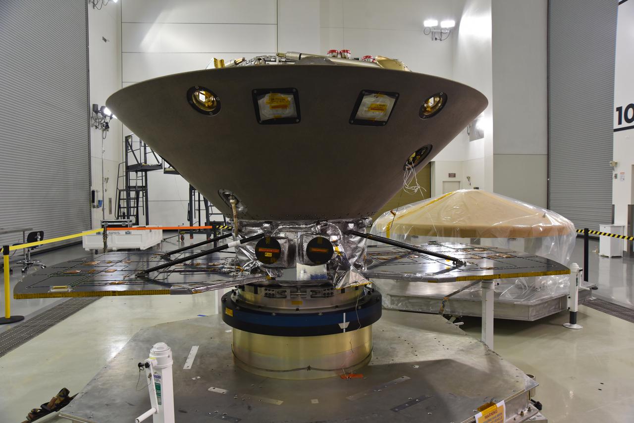 NASA's Interior Exploration using Seismic Investigations, Geodesy and Heat Transport, or InSight, is in a clean room inside the Astrotech processing facility at Vandenberg Air Force Base in California. The spacecraft's protective heat shield is in view at right. InSight is scheduled for liftoff on a United Launch Alliance Atlas V rocket May 5, 2018. InSight will be the first mission to look deep beneath the Martian surface. It will study the planet's interior by measuring its heat output and listen for marsquakes. InSight will use the seismic waves generated by marsquakes to develop a map of the planet’s deep interior. The resulting insight into Mars’ formation will provide a better understanding of how other rocky planets, including Earth, were created. NASA’s Jet Propulsion Laboratory in Pasadena, California, manages the InSight mission for the agency’s Science Mission Directorate. InSight is part of NASA's Discovery Program, managed by its Marshall Space Flight Center in Huntsville, Alabama. The spacecraft, including cruise stage and lander, was built and tested by Lockheed Martin Space in Denver. Several European partners, including France's space agency, the Centre National d'Étude Spatiales, and the German Aerospace Center, are supporting the mission. United Launch Alliance of Centennial, Colorado, is providing the Atlas V launch service. NASA’s Launch Services Program, based at its Kennedy Space Center in Florida, is responsible for launch management. 