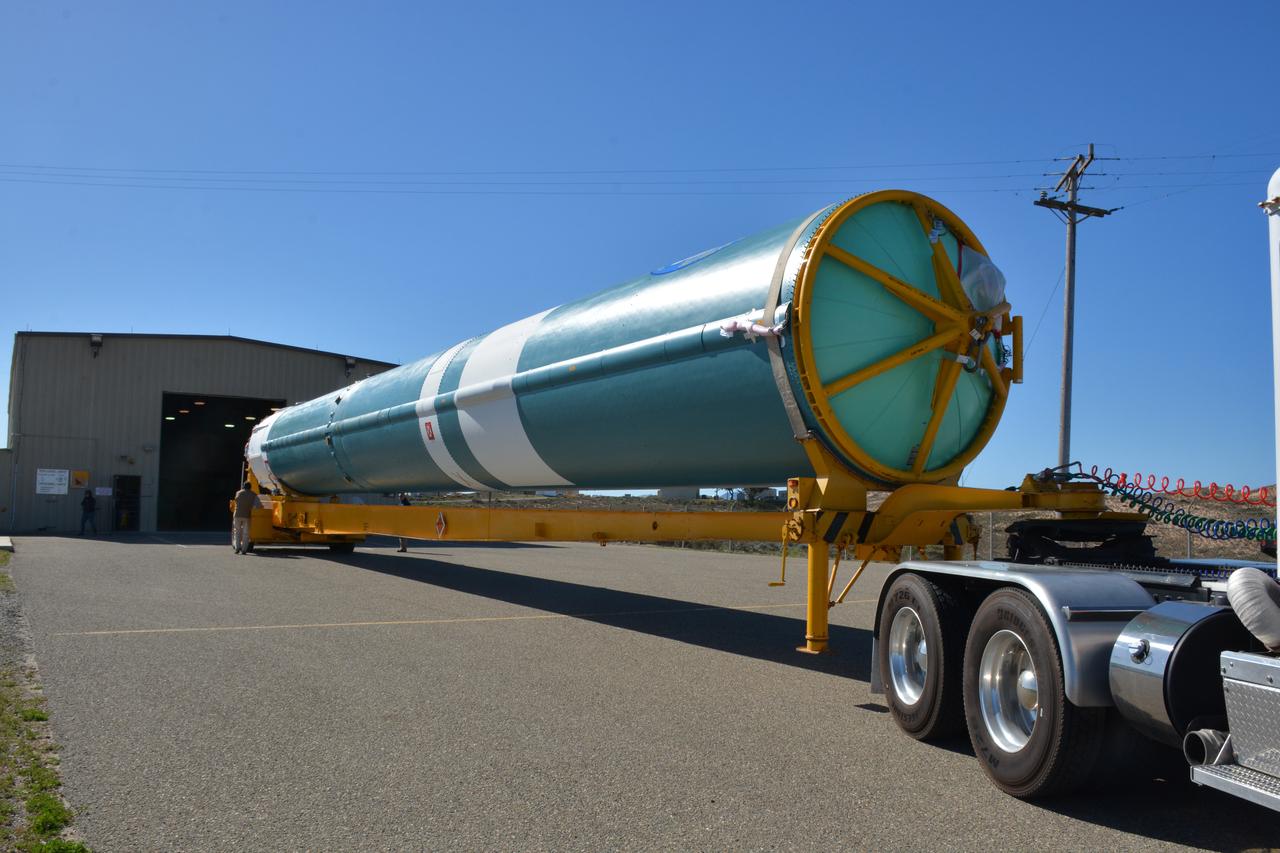 At NASA's Building 836, the Spacecraft Labs Telemetry Station at Vandenberg Air Force Base in California, on Tuesday, April 17, 2018, a United Launch Alliance (ULA) Delta II booster is transported to Space Launch Complex-2 where it will launch NASA's Ice, Cloud and land Elevation Satellite-2, or ICESat-2, satellite. This will be the last flight for the venerable Delta II rocket. ICESat-2, which is being built and tested by Orbital ATK in Gilbert, Arizona, will carry a single instrument called the Advanced Topographic Laser Altimeter System, or ATLAS. The ATLAS instrument is being built and tested at NASA’s Goddard Space Flight Center in Greenbelt Maryland. Once in orbit, the satellite is designed to measure the height of a changing Earth, one laser pulse at a time, 10,000 laser pulses a second. ICESat-2 will help scientists investigate why, and how much, Earth’s frozen and icy areas, called the cryosphere, are changing.
