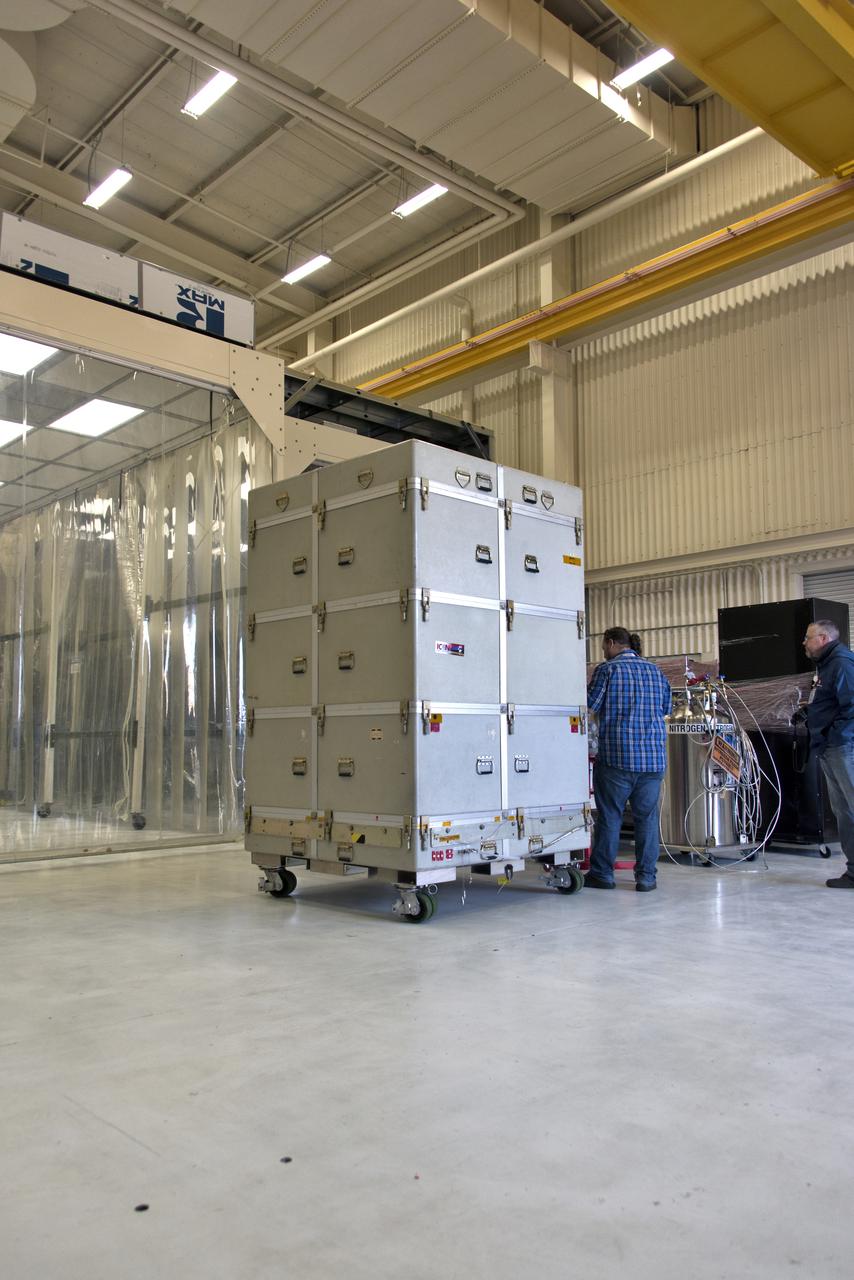 NASA's Ionospheric Connection Explorer (ICON), inside its shipping container, is moved inside Building 1555 on May 1, 2018, at Vandenberg Air Force Base in California. The explorer will launch on June 15, 2018, from Kwajalein Atoll in the Marshall Islands (June 14 in the continental United States) on Orbital ATK's Pegasus XL rocket, which is attached to the company's L-1011 Stargazer aircraft. ICON will study the frontier of space - the dynamic zone high in Earth's atmosphere where terrestrial weather from below meets space weather above. The explorer will help determine the physics of Earth's space environment and pave the way for mitigating its effects on our technology, communications systems and society.