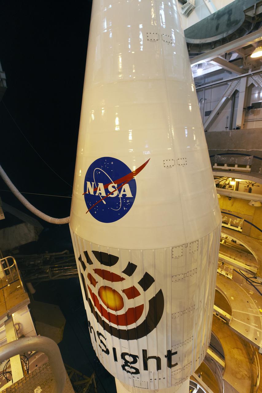 At Vandenberg Air Force Base in California, the gantry rolls back at Space Launch Complex 3 in preparation for the liftoff of NASA's Interior Exploration using Seismic Investigations, Geodesy and Heat Transport, or InSight, Mars lander. The United Launch Alliance Atlas V rocket now is poised to boost the spacecraft with liftoff scheduled for 4:05 a.m. PDT (7:05 a.m. EDT). InSight will be the first mission to look deep beneath the Martian surface. It will study the planet's interior by measuring its heat output and listen for marsquakes. InSight will use the seismic waves generated by marsquakes to develop a map of the planet’s deep interior. The resulting insight into Mars’ formation will provide a better understanding of how other rocky planets, including Earth, were created.