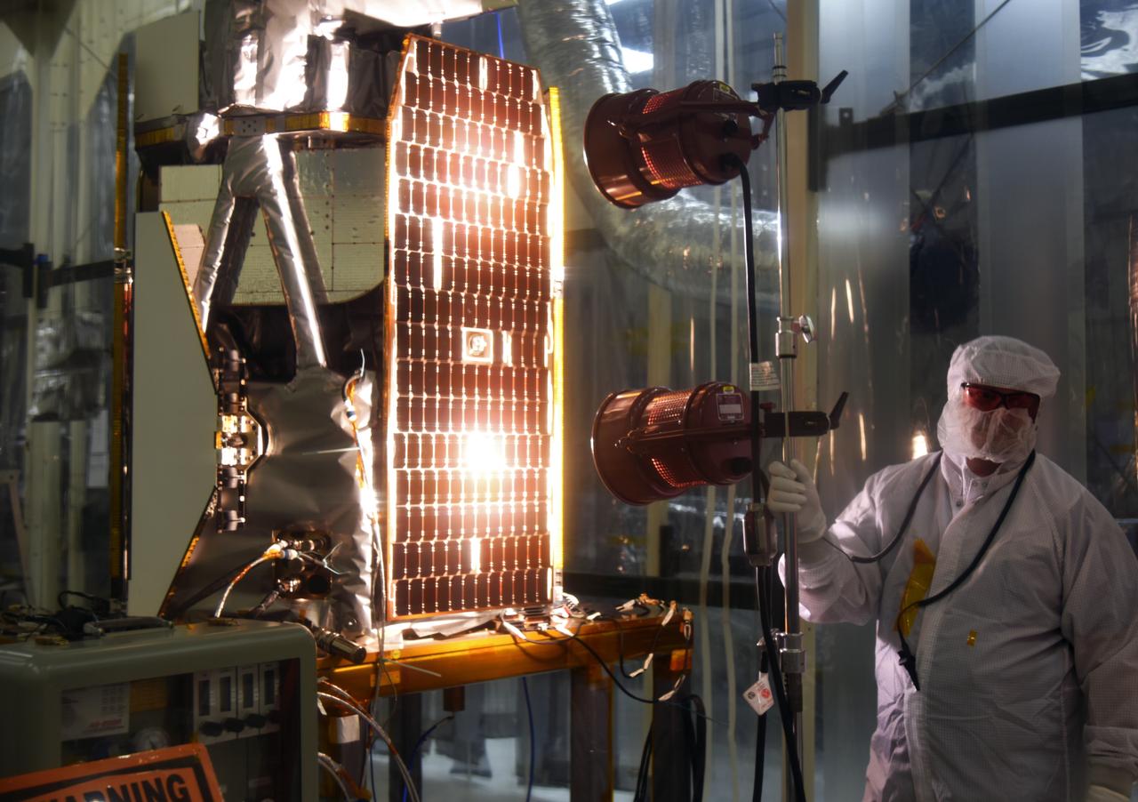 A solar array illumination test is performed on NASA's Ionospheric Connection Explorer (ICON) in a clean room on May 4, 2018, inside Building 1555 at Vandenberg Air Force Base in California. The test checks for any imperfections and confirms that the solar arrays are functioning properly. The explorer will launch on June 15, 2018, from Kwajalein Atoll in the Marshall Islands (June 14 in the continental United States) on Orbital ATK's Pegasus XL rocket, which is attached to the company's L-1011 Stargazer aircraft. ICON will study the frontier of space - the dynamic zone high in Earth's atmosphere where terrestrial weather from below meets space weather above. The explorer will help determine the physics of Earth's space environment and pave the way for mitigating its effects on our technology, communications systems and society.