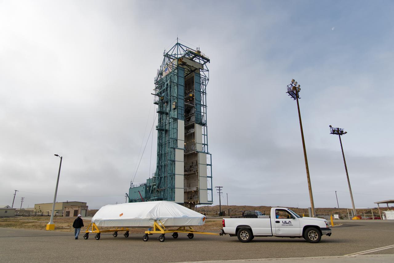 The first half of the United Launch Alliance (ULA) Delta II rocket payload fairing is transported to the Vertical Integration Facility at Space Launch Complex 2 at Vandenberg Air Force Base in California, on June 4, 2018. NASA's Ice, Cloud and land Elevation Satellite-2 (ICESat-2) will launch later this year on the final Delta II rocket. ICESat-2 will measure the height of a changing Earth, one laser pulse at a time, 10,000 laser pulses a second. The satellite will carry a single instrument, the Advanced Topographic Laser Altimeter System. ICESat-2 will help scientists investigate why, and how much our planet's frozen and icy areas, called the cryosphere, is changing in a warming climate.