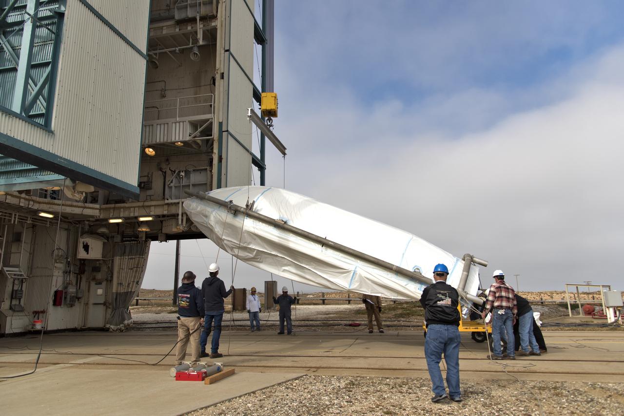 The first half of the United Launch Alliance (ULA) Delta II rocket payload fairing is transported to the Vertical Integration Facility at Space Launch Complex 2 at Vandenberg Air Force Base in California, on June 4, 2018. NASA's Ice, Cloud and land Elevation Satellite-2 (ICESat-2) will launch later this year on the final Delta II rocket. ICESat-2 will measure the height of a changing Earth, one laser pulse at a time, 10,000 laser pulses a second. The satellite will carry a single instrument, the Advanced Topographic Laser Altimeter System. ICESat-2 will help scientists investigate why, and how much our planet's frozen and icy areas, called the cryosphere, is changing in a warming climate.