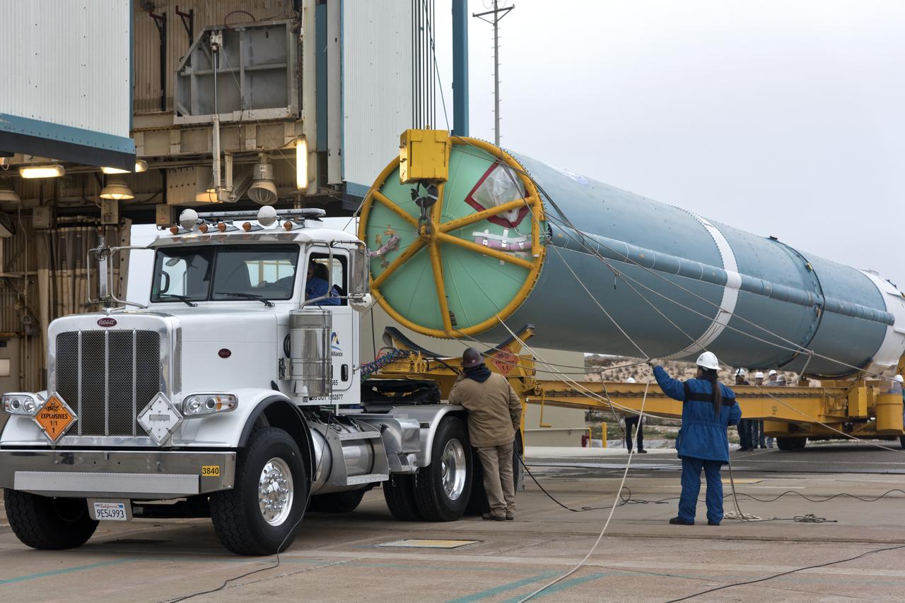 United Launch Alliance (ULA) workers assist as the Delta II first stage is lifted to vertical at Space Launch Complex 2 on June 8, 2018, at Vandenberg Air Force Base in California. The booster will be moved into the mobile service tower. NASA's Ice, Cloud and land Elevation Satellite-2 (ICESat-2) will launch on the final Delta II rocket. ICESat-2 will measure the height of a changing Earth, one laser pulse at a time, 10,000 laser pulses a second. The satellite will carry a single instrument, the Advanced Topographic Laser Altimeter System. ICESat-2 will help scientists investigate why, and how much our planet's frozen and icy areas, called the cryosphere, is changing in a warming climate.