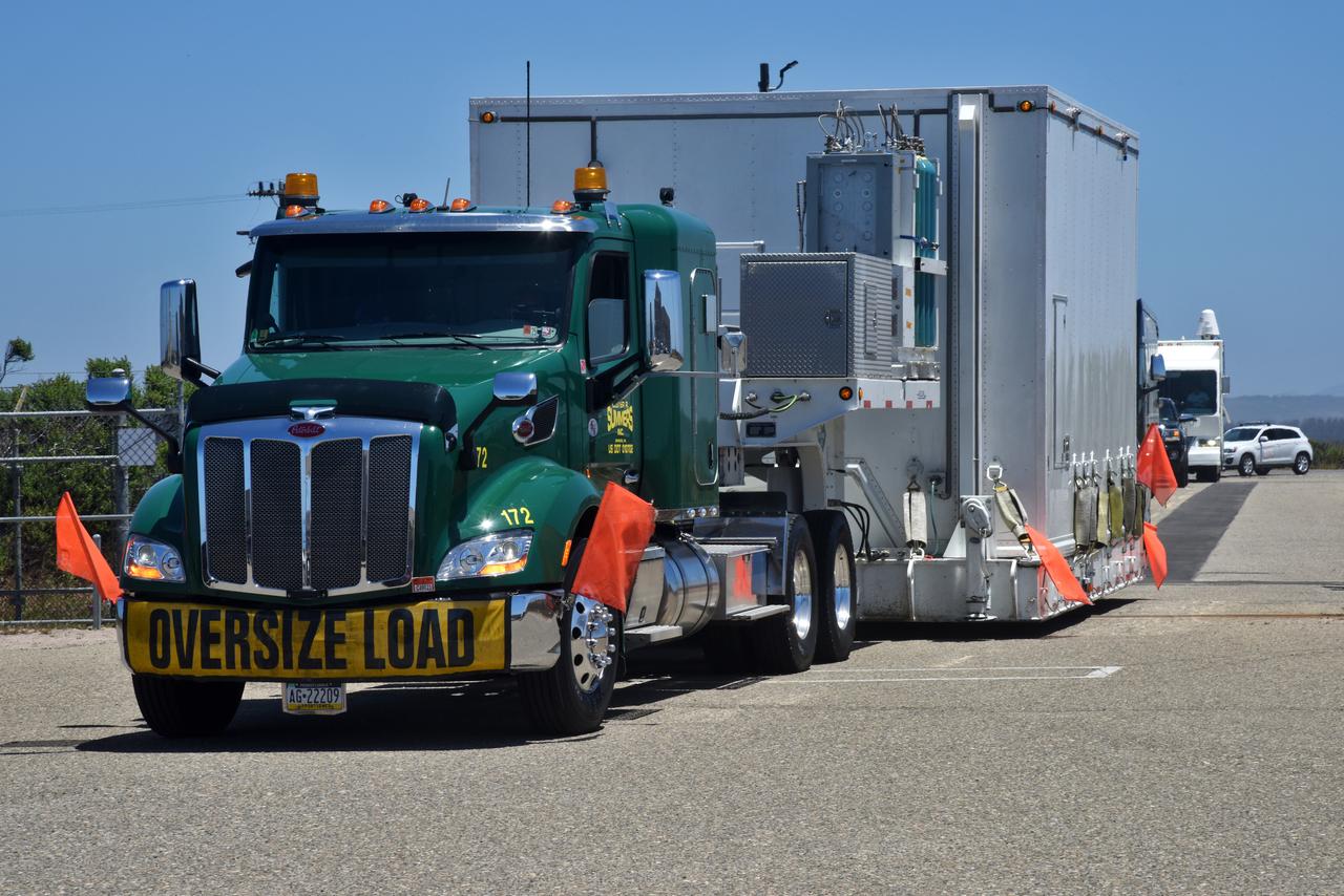 NASA's Ice, Cloud and land Elevation Satellite-2 (ICESat-2) arrives in its shipping container aboard a heavy transport truck on June 12, 2018, at Vandenberg Air Force Base in California. ICESat-2 was shipped from the Northrop Grumman facility in Gilbert, Arizona, where it was built and tested. The satellite is scheduled to launch Sept. 12, 2018, on the final United Launch Alliance Delta II rocket from Space Launch Complex-2 at Vandenberg. ICESat-2 will measure the height of a changing Earth, one laser pulse at a time, 10,000 laser pulses a second. The satellite will carry the Advanced Topographic Laser Altimeter System. ICESat-2 will help scientists investigate why, and how much our planet's frozen and icy areas, called the cryosphere, is changing in a warming climate.
