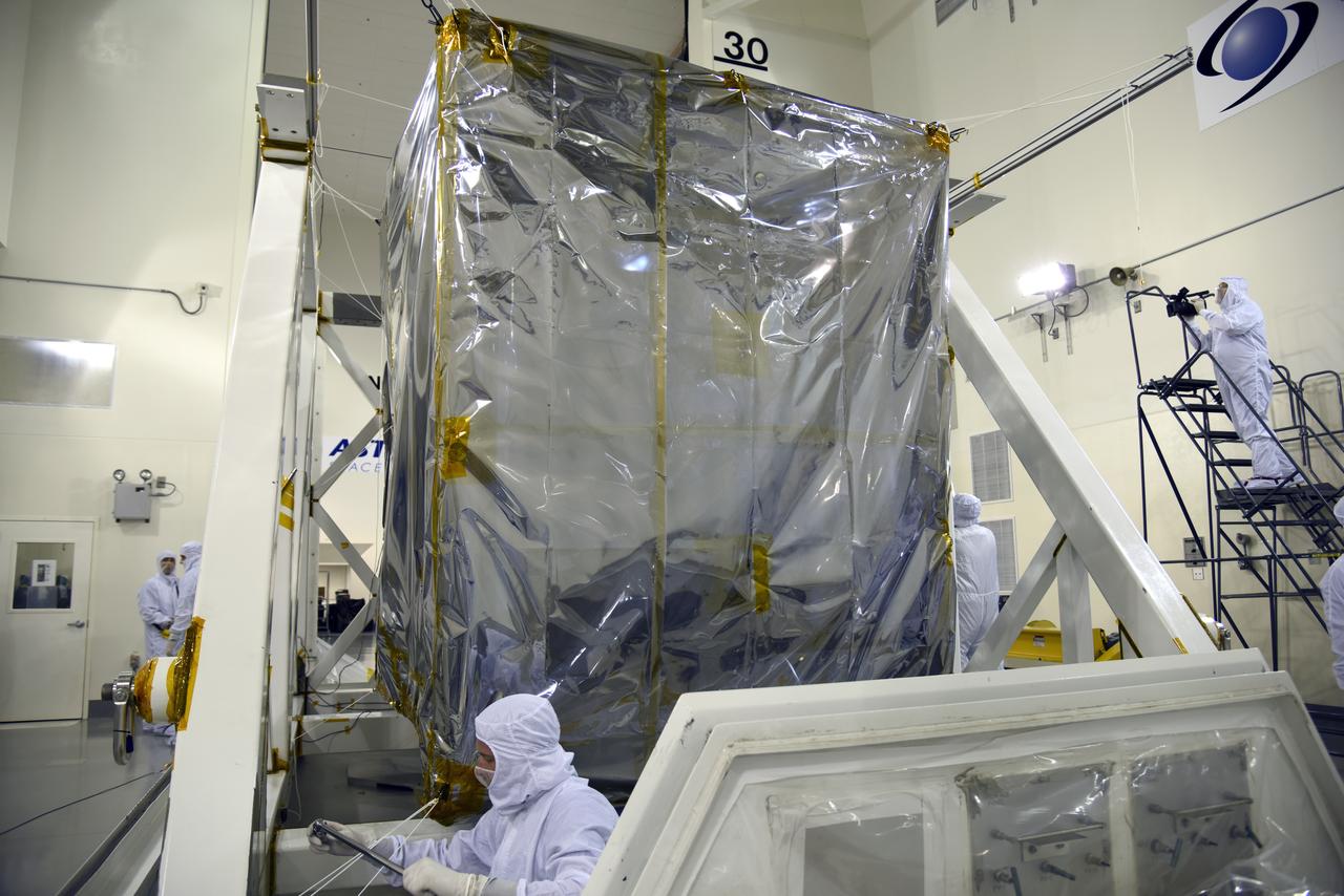 NASA's Ice, Cloud and land Elevation Satellite-2 (ICESat-2) is uncrated inside the airlock of the Astrotech processing facility on June 13, 2018, at Vandenberg Air Force Base in California. ICESat-2 was shipped from the Northrop Grumman facility in Gilbert, Arizona, where it was built and tested. The satellite is scheduled to launch from Space Launch Complex-2 at Vandenberg on the final United Launch Alliance Delta II rocket. ICESat-2 will measure the height of a changing Earth, one laser pulse at a time, 10,000 laser pulses a second. The satellite will carry the Advanced Topographic Laser Altimeter System. ICESat-2 will help scientists investigate why, and how much our planet's frozen and icy areas, called the cryosphere, is changing in a warming climate.