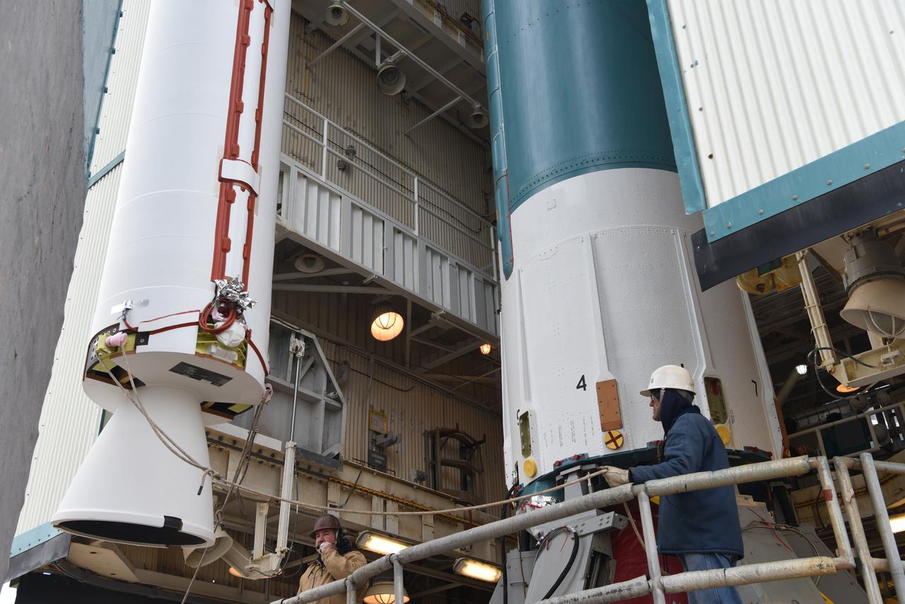 The solid rocket motor for mating to the United Launch Alliance Delta II launch vehicle is lifted up at the Vertical Integration Facility (VIF) at Space Launch Complex 2 on June 14, 2018, at Vandenberg Air Force Base in California. The solid rocket motor will be attached to the rocket. NASA's Ice, Cloud and land Elevation Satellite-2 (ICESat-2) will launch on the final Delta II rocket. ICESat-2 will measure the height of a changing Earth, one laser pulse at a time, 10,000 laser pulses a second. The satellite will carry a single instrument, the Advanced Topographic Laser Altimeter System. ICESat-2 will help scientists investigate why, and how much our planet's frozen and icy areas, called the cryosphere, is changing in a warming climate.