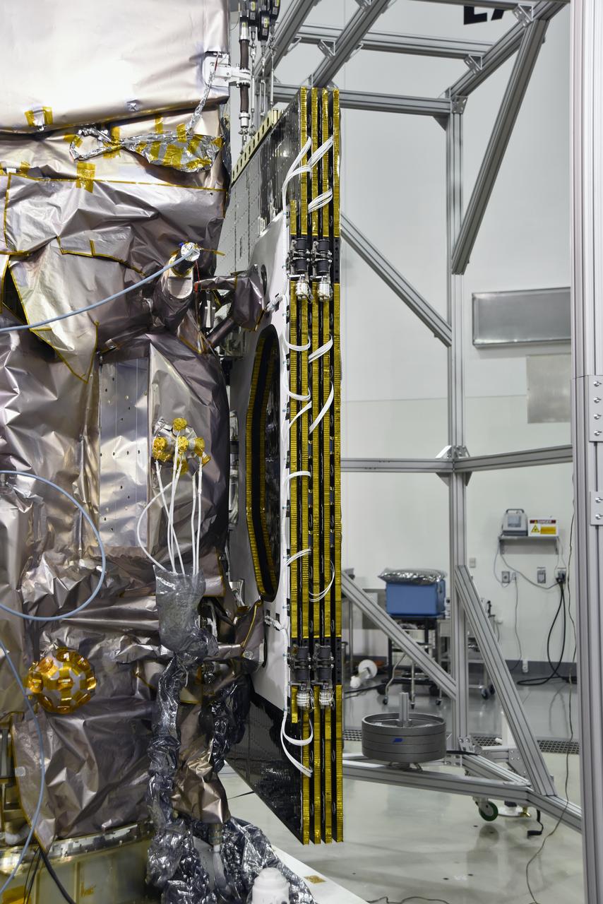 Inside the high bay of the Astrotech Space Operations facility at Vandenberg Air Force Base in California, a solar array first motion test is in progress on NASA's Ice, Cloud and land Elevation Satellite-2 (ICESat-2) on June 18, 2018. The satellite is being prepared for its scheduled launch from Space Launch Complex-2 at Vandenberg on the final United Launch Alliance Delta II rocket. ICESat-2 will measure the height of a changing Earth, one laser pulse at a time, 10,000 laser pulses a second. The satellite will carry the Advanced Topographic Laser Altimeter System. ICESat-2 will help scientists investigate why, and how much our planet's frozen and icy areas, called the cryosphere, is changing in a warming climate.