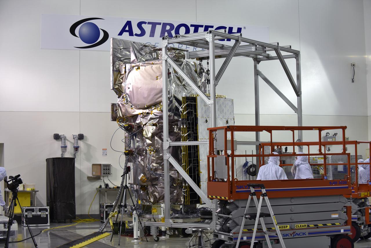 Inside the high bay of the Astrotech Space Operations facility at Vandenberg Air Force Base in California, a solar array first motion test is underway on NASA's Ice, Cloud and land Elevation Satellite-2 (ICESat-2) on June 18, 2018. The satellite is being prepared for its scheduled launch from Space Launch Complex-2 at Vandenberg on the final United Launch Alliance Delta II rocket. ICESat-2 will measure the height of a changing Earth, one laser pulse at a time, 10,000 laser pulses a second. The satellite will carry the Advanced Topographic Laser Altimeter System. ICESat-2 will help scientists investigate why, and how much our planet's frozen and icy areas, called the cryosphere, is changing in a warming climate.