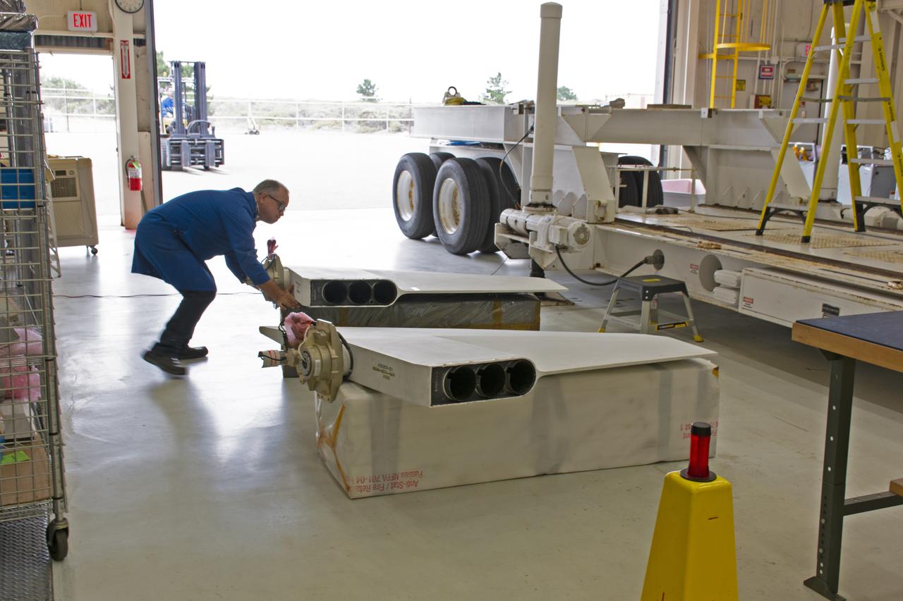 The fins for Northrop Grumman's Pegasus XL rocket arrive at Building 1555 at Vandenberg Air Force Base in California, on July 30, 2018. Technicians will prepare the fins for installation on the Pegasus XL rocket, which will be attached beneath the company's L-1011 Stargazer aircraft, to launch NASA's Ionospheric Connection Explorer (ICON) from the Skid Strip at Cape Canaveral Air Force Station in Florida. Launch is scheduled for Oct. 26. ICON will study the frontier of space - the dynamic zone high in Earth's atmosphere where terrestrial weather from below meets space weather above. The explorer will help determine the physics of Earth's space environment and pave the way for mitigating its effects on our technology, communications systems and society.