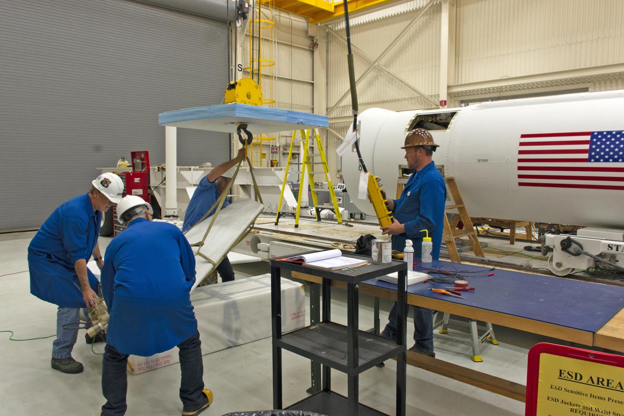 Inside Building 1555 at Vandenberg Air Force Base in California, technicians prepare the fins for installation on Northrop Grumman's Pegasus XL rocket on July 30, 2018. The Pegasus XL rocket, attached beneath the company's L-1011 Stargazer aircraft, will launch NASA's Ionospheric Connection Explorer (ICON) from the Skid Strip at Cape Canaveral Air Force Station in Florida. Launch is scheduled for Oct. 26. ICON will study the frontier of space - the dynamic zone high in Earth's atmosphere where terrestrial weather from below meets space weather above. The explorer will help determine the physics of Earth's space environment and pave the way for mitigating its effects on our technology, communications systems and society.