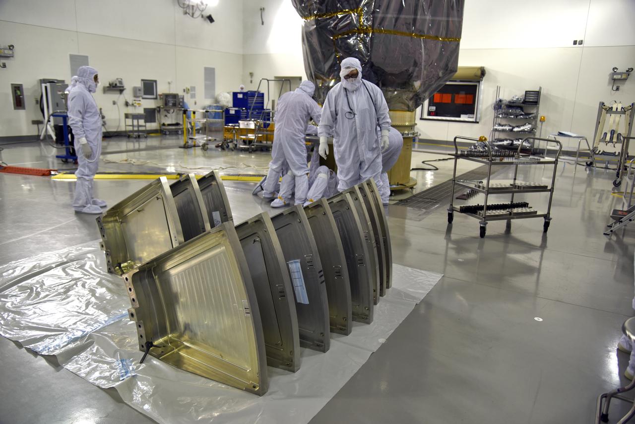Inside the high bay of the Astrotech Space Operations facility at Vandenberg Air Force Base in California, technicians attach NASA's Ice, Cloud and land Elevation Satellite-2 (ICESat-2) to the payload direct mate adapter, on Aug. 24, 2018. The satellite is being prepared for its scheduled launch from Space Launch Complex 2 at Vandenberg on the final United Launch Alliance Delta II rocket. ICESat-2 will measure the height of a changing Earth, one laser pulse at a time, 10,000 laser pulses a second. The satellite will carry the Advanced Topographic Laser Altimeter System (ATLAS). ICESat-2 will help scientists investigate why, and how much our planet's frozen and icy areas, called the cryosphere, are changing in a warming climate.