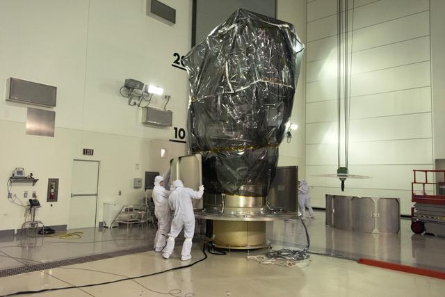 NASA image: Delta II ICESat-2 Transport Can Installation and Lift to Transpo