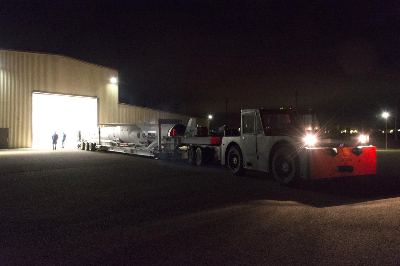 The Northrop Grumman Pegasus XL vehicle is transported from Building 1555 to the hot pad at Vandenberg Air Force Base in California, on Oct. 14, 2018. NASA's Ionospheric Connection Explorer (ICON) is secured inside the rocket's payload fairing. The Pegasus XL rocket will be attached beneath the company's L-1011 Stargazer aircraft, and travel to the Skid Strip at Cape Canaveral Air Force Station in Florida. ICON will launch aboard the Pegasus XL rocket on Oct. 26, 2018, from the Skid Strip at the Cape.  ICON will study the frontier of space - the dynamic zone high in Earth's atmosphere where terrestrial weather from below meets space weather above. The explorer will help determine the physics of Earth's space environment and pave the way for mitigating its effects on our technology, communications systems and society.