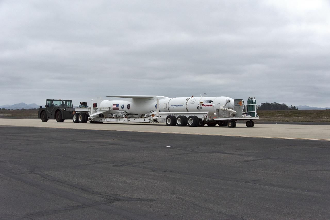 Northrop Grumman's Pegasus XL rocket, containing NASA's Ionospheric Connection Explorer (ICON), is transported to the hot pad at Vandenberg Air Force Base in California, on Oct. 14, 2018. Pegasus will be attached beneath the company's L-1011 Stargazer aircraft for the trip to Cape Canaveral Air Force Station in Florida. The Pegasus XL rocket will launch ICON from the Skid Strip at the Cape. ICON will study the frontier of space - the dynamic zone high in Earth's atmosphere where terrestrial weather from below meets space weather above. The explorer will help determine the physics of Earth's space environment and pave the way for mitigating its effects on our technology and communications systems.