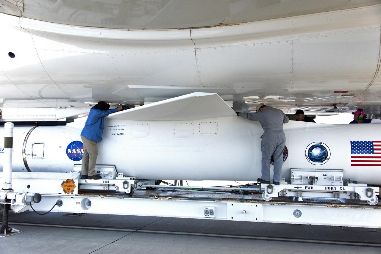 Technicians secure Northrop Grumman's Pegasus XL rocket, containing NASA's Ionospheric Connection Explorer (ICON), beneath the company's L-1011 Stargazer aircraft at the hot pad at Vandenberg Air Force Base in California, on Oct. 14, 2018. The Stargazer will take off from the hot pad and travel to Cape Canaveral Air Force Station in Florida. The Pegasus XL rocket will launch ICON from the Skid Strip at the Cape. ICON will study the frontier of space - the dynamic zone high in Earth's atmosphere where terrestrial weather from below meets space weather above. The explorer will help determine the physics of Earth's space environment and pave the way for mitigating its effects on our technology and communications systems.