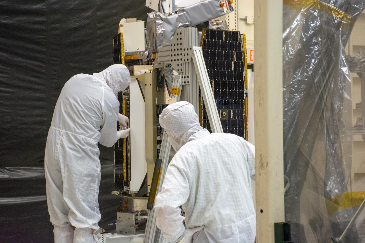Technicians prepare NASA's Ionospheric Connection Explorer (ICON) for a solar array deployment test inside Building 1555 at Vandenberg Air Force Base in California on Aug. 10, 2019. ICON will launch on a Pegasus XL rocket, attached beneath the company's L-1011 Stargazer aircraft, from the Skid Strip at Cape Canaveral Air Force Station in Florida. Launch is scheduled for Oct. 10. ICON will study the frontier of space - the dynamic zone high in Earth's atmosphere where terrestrial weather from below meets space weather above. The explorer will help determine the physics of Earth's space environment and pave the way for mitigating its effects on our technology and communications systems.