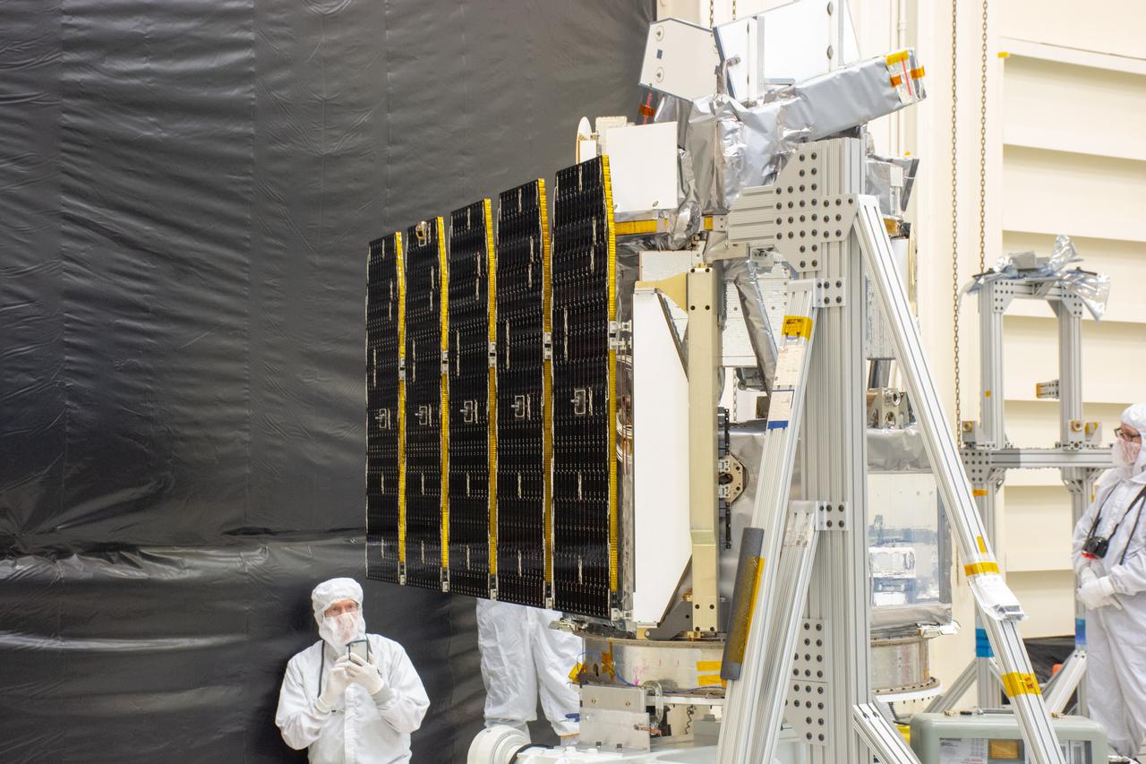Technicians extend the solar array on NASA's Ionospheric Connection Explorer (ICON) during a deployment test inside Building 1555 at Vandenberg Air Force Base in California on Aug. 10, 2019. ICON will launch on a Pegasus XL rocket, attached beneath the company's L-1011 Stargazer aircraft, from the Skid Strip at Cape Canaveral Air Force Station in Florida. Launch is scheduled for Oct. 10. ICON will study the frontier of space - the dynamic zone high in Earth's atmosphere where terrestrial weather from below meets space weather above. The explorer will help determine the physics of Earth's space environment and pave the way for mitigating its effects on our technology and communications systems.