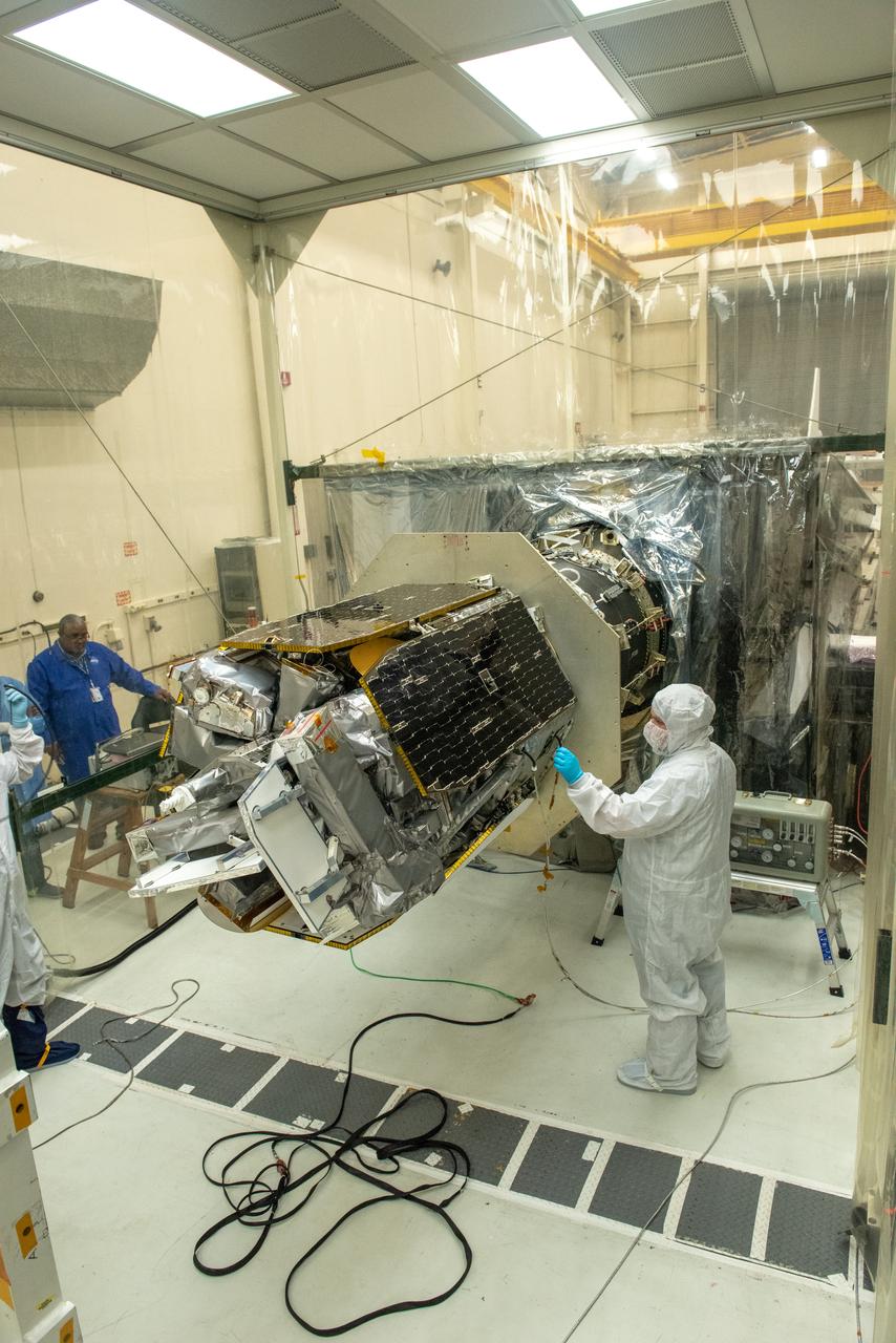 Technicians attach NASA’s Ionospheric Connection Explorer (ICON) to the Northrop Grumman Pegasus XL rocket inside Building 1555 at Vandenberg Air Force Base in California, on Sept. 10, 2019. The Pegasus XL rocket, attached beneath the company's L-1011 Stargazer aircraft, will launch ICON from the Skid Strip at Cape Canaveral Air Force Station in Florida. Launch is scheduled for Oct. 9, 2019. ICON will study the frontier of space - the dynamic zone high in Earth's atmosphere where terrestrial weather from below meets space weather above. The explorer will help determine the physics of Earth's space environment and pave the way for mitigating its effects on our technology and communications systems.