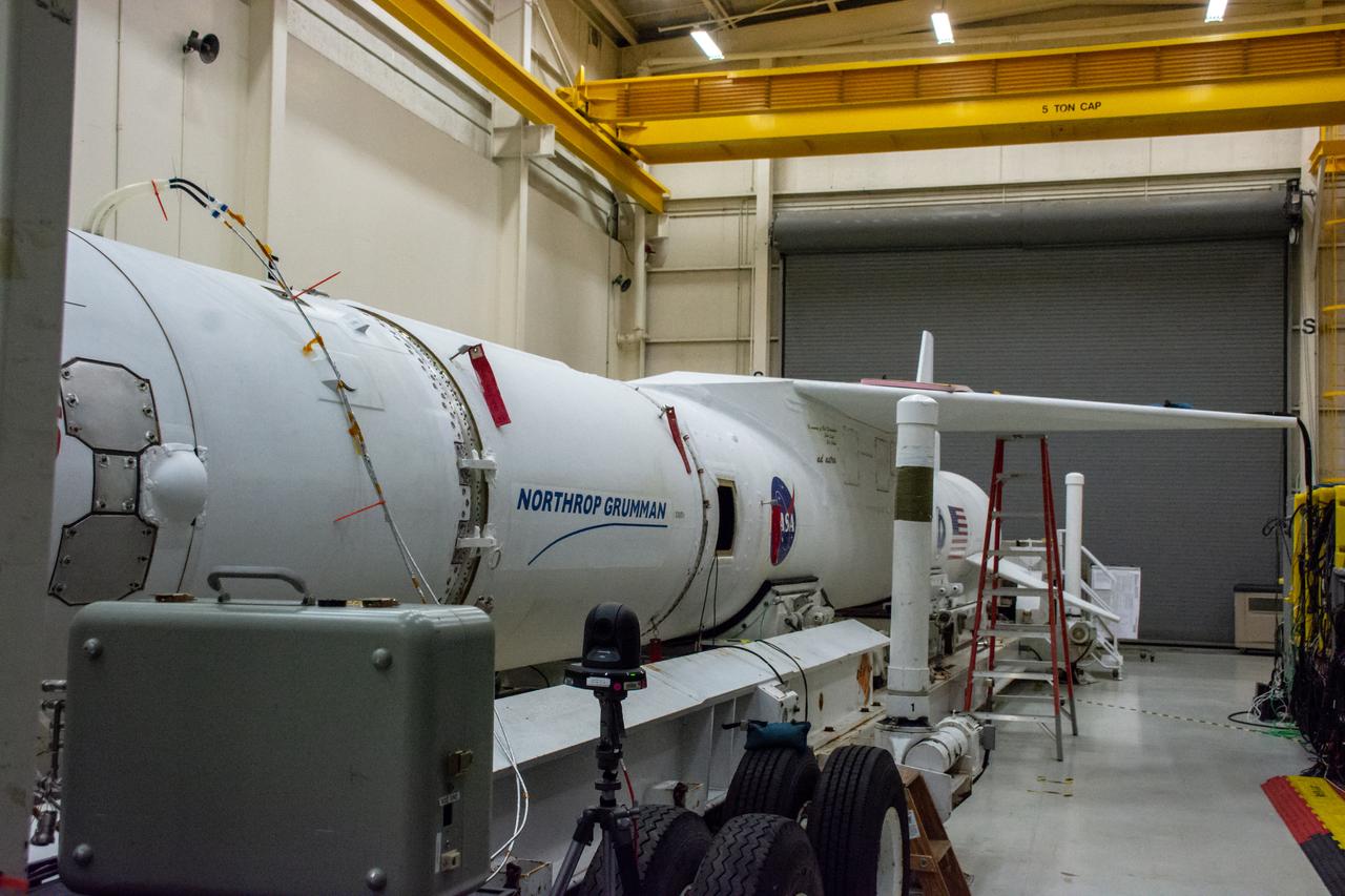 The Northrop Grumman Pegasus XL rocket containing NASA's Ionospheric Connection Explorer (ICON) is seen outside the cleanroom after assembly at Vandenberg Air Force Base in California on Sept 19, 2019. ICON launched on the Pegasus XL rocket, attached beneath the company's L-1011 Stargazer aircraft, on Oct. 10, 2019, after takeoff from the Skid Strip at Cape Canaveral Air Force Station in Florida. ICON will study the frontier of space - the dynamic zone high in Earth's atmosphere where terrestrial weather from below meets space weather above. The explorer will help determine the physics of Earth's space environment and pave the way for mitigating its effects on our technology, communications systems and society.