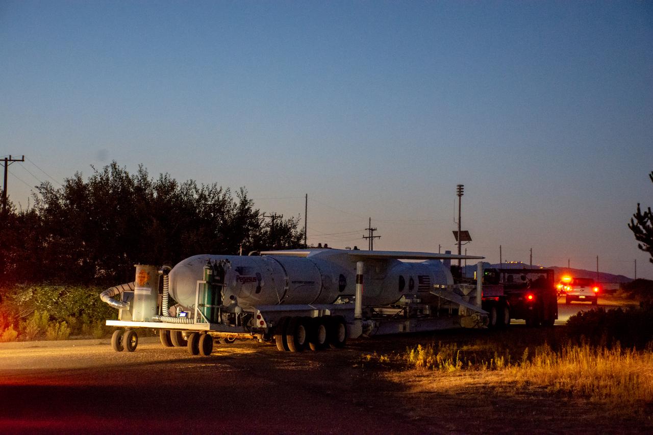 The Northrop Grumman Pegasus XL rocket, with NASA's Ionospheric Connection Explorer (ICON) secured in its payload fairing, rolls out to the runway at Vandenberg Air Force Base in California on Sept. 25, 2019. The Pegasus XL rocket will be attached beneath the company's L-1011 Stargazer aircraft for the flight to Cape Canaveral Air Force Station (CCAFS) in Florida. ICON will launch from the Skid Strip at CCAFS. Launch is scheduled for Oct. 10, 2019. ICON will study the frontier of space - the dynamic zone high in Earth's atmosphere where terrestrial weather from below meets space weather above. The explorer will help determine the physics of Earth's space environment and pave the way for mitigating its effects on our technology and communications systems.