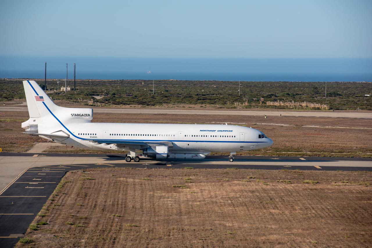 Northrop Grumman's L-1011 Stargazer awaits takeoff from Vandenberg Air Force Base in California on Oct. 1, 2019. The company's Pegasus XL rocket, containing NASA's Ionospheric Connection Explorer (ICON), is attached beneath the aircraft. The explorer is targeted to launch on Oct. 9, 2019, from Cape Canaveral Air Force Station in Florida. ICON will study the frontier of space - the dynamic zone high in Earth's atmosphere where terrestrial weather from below meets space weather above.