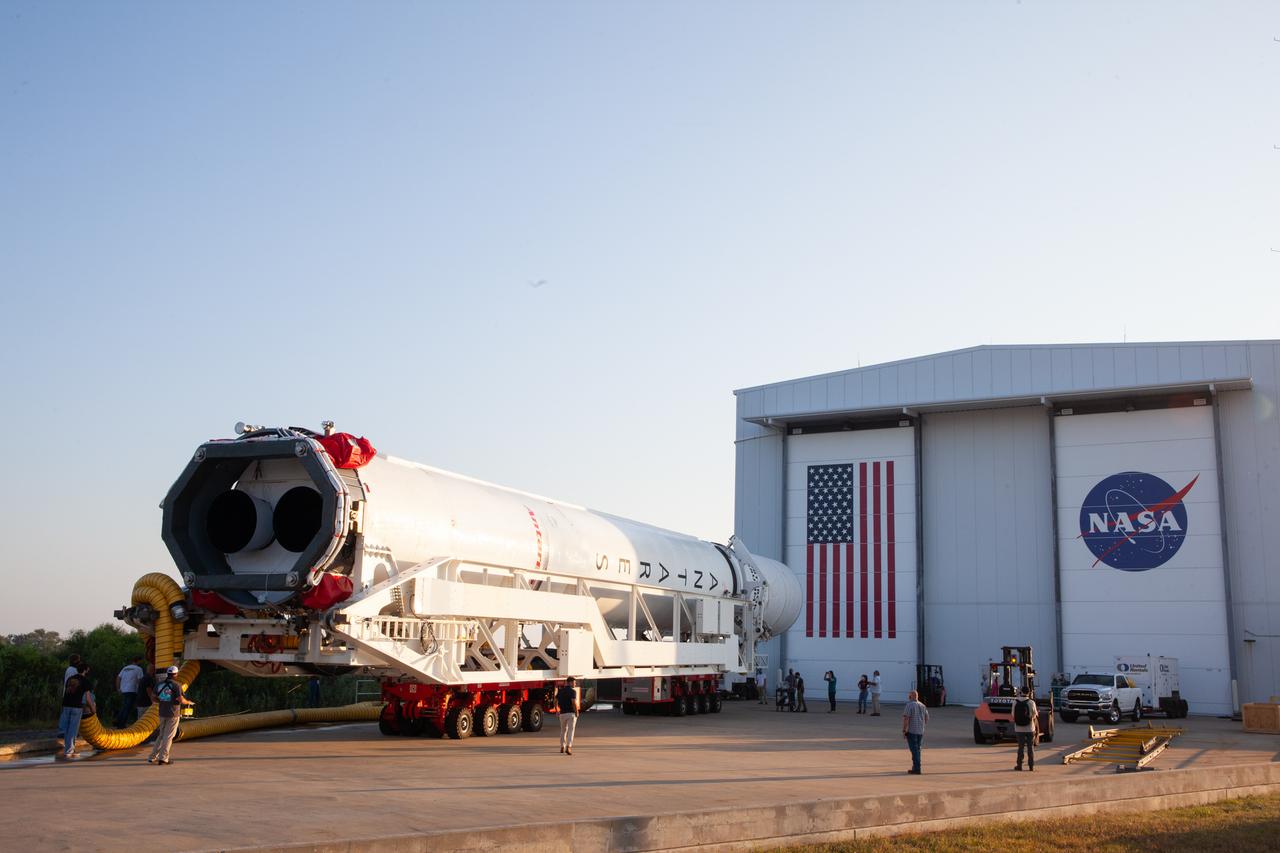 A Northrop Grumman Antares rocket carrying a Cygnus resupply spacecraft is seen as it is rolled out of the Horizontal Integration Facility on its way to the Mid-Atlantic Regional Spaceport’s Pad-0A, Friday, Aug. 6, 2021, at NASA's Wallops Flight Facility in Virginia. Northrop Grumman’s 14th contracted cargo resupply mission with NASA to the International Space Station will deliver about 8,200 pounds of science and research, crew supplies and vehicle hardware to the orbital laboratory and its crew. Northrop Grumman named the NG CRS-16 Cygnus spacecraft after NASA astronaut Ellison Onizuka,  in honor of his prominence as the first Asian American astronaut. Onizuka was hired in 1978 in the first class of diverse astronauts, and his first spaceflight was aboard space shuttle Discovery in January 1985 for STS-51-C. He lost his life aboard the space shuttle Challenger in 1986.  The launch is scheduled for 5:56 p.m. EDT, Aug. 10, 2021.  Photo Credit: NASA/Brian Bonsteel
