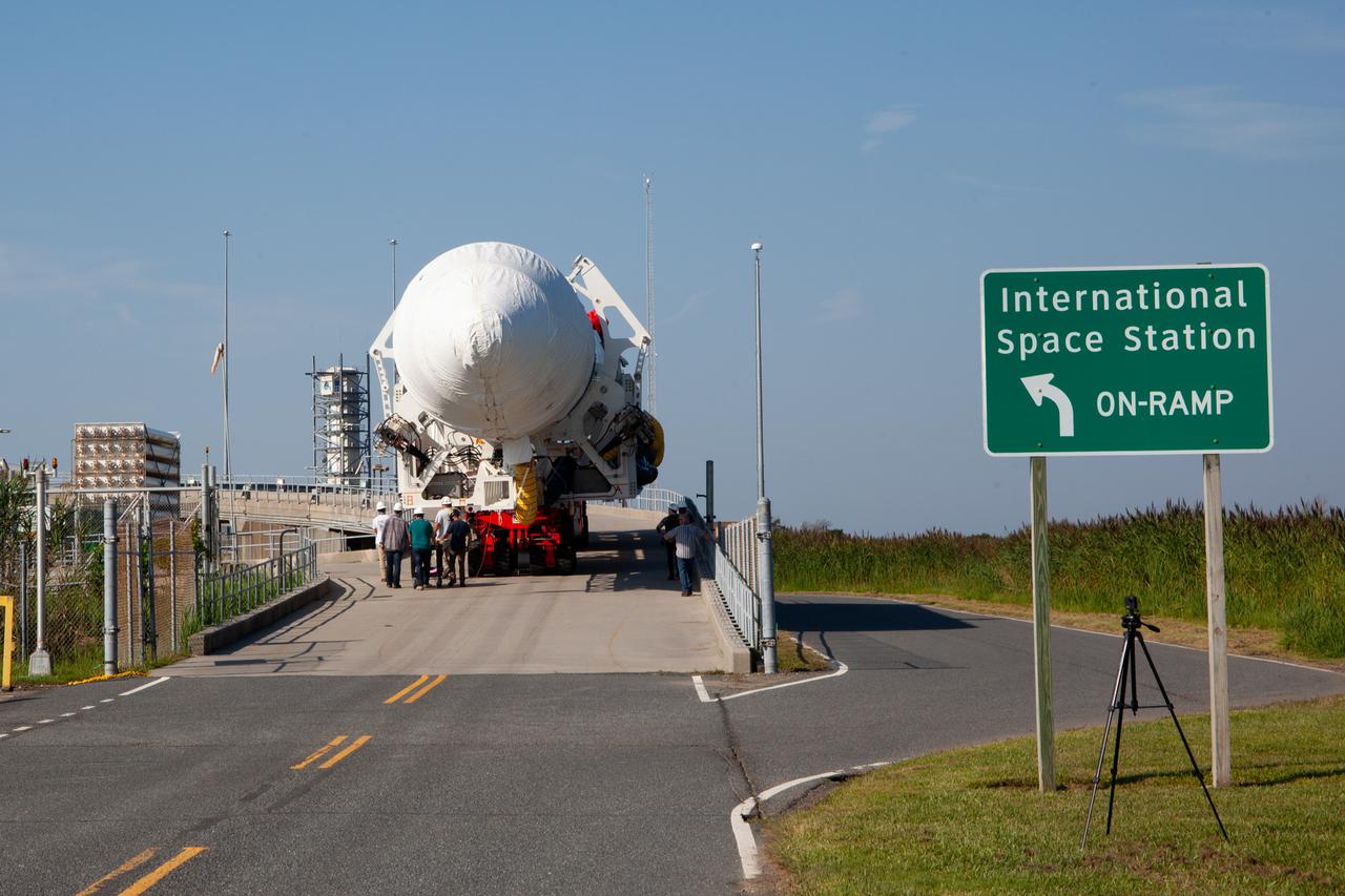 A Northrop Grumman Antares rocket carrying a Cygnus resupply spacecraft arrives at the Mid-Atlantic Regional Spaceport’s Pad-0A, Friday, Aug. 6,, 2021, at NASA's Wallops Flight Facility in Virginia. Northrop Grumman’s 16th contracted cargo resupply mission with NASA to the International Space Station will deliver about 8,200 pounds of science and research, crew supplies and vehicle hardware to the orbital laboratory and its crew. Northrop Grumman named the NG CRS-16 Cygnus spacecraft after NASA astronaut Ellison Onizuka,  in honor of his prominence as the first Asian American astronaut. Onizuka was hired in 1978 in the first class of diverse astronauts, and his first spaceflight was aboard space shuttle Discovery in January 1985 for STS-51-C. He lost his life aboard the space shuttle Challenger in 1986.  The launch is scheduled for 5:56 p.m. EDT, Aug. 10, 2021.   Photo Credit: NASA/Brian Bonsteel