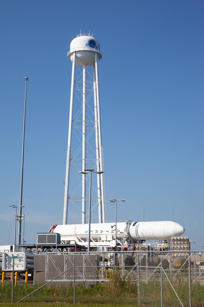 A Northrop Grumman Antares rocket carrying a Cygnus resupply spacecraft arrives at the Mid-Atlantic Regional Spaceport’s Pad-0A, Friday, Aug. 6,, 2021, at NASA's Wallops Flight Facility in Virginia. Northrop Grumman’s 16th contracted cargo resupply mission with NASA to the International Space Station will deliver about 8,200 pounds of science and research, crew supplies and vehicle hardware to the orbital laboratory and its crew. Northrop Grumman named the NG CRS-16 Cygnus spacecraft after NASA astronaut Ellison Onizuka,  in honor of his prominence as the first Asian American astronaut. Onizuka was hired in 1978 in the first class of diverse astronauts, and his first spaceflight was aboard space shuttle Discovery in January 1985 for STS-51-C. He lost his life aboard the space shuttle Challenger in 1986.  The launch is scheduled for 5:56 p.m. EDT, Aug. 10, 2021.   Photo Credit: NASA/Brian Bonsteel