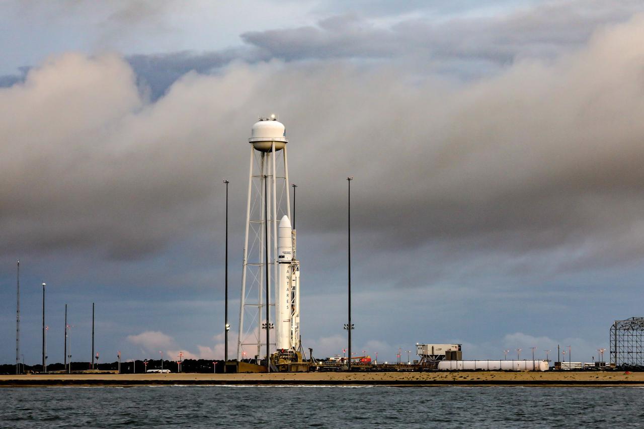 A Northrop Grumman Antares rocket carrying a Cygnus resupply spacecraft is seen at sunrise on the Mid-Atlantic Regional Spaceport’s Pad-0A, Aug. 7, 2021, at NASA's Wallops Flight Facility in Virginia. Northrop Grumman’s 16th contracted cargo resupply mission with NASA to the International Space Station will deliver nearly 8,200 pounds of science and research, crew supplies and vehicle hardware to the orbital laboratory and its crew. Northrop Grumman named the NG CRS-16 Cygnus spacecraft after NASA astronaut Ellison Onizuka,  in honor of his prominence as the first Asian American astronaut. Onizuka was hired in 1978 in the first class of diverse astronauts, and his first spaceflight was aboard space shuttle Discovery in January 1985 for STS-51-C. He lost his life aboard the space shuttle Challenger in 1986. Launch is scheduled for 5:56 p.m. EDT, Tuesday, Aug. 10, 2021.  Photo Credit: NASA/Terry Zaperach