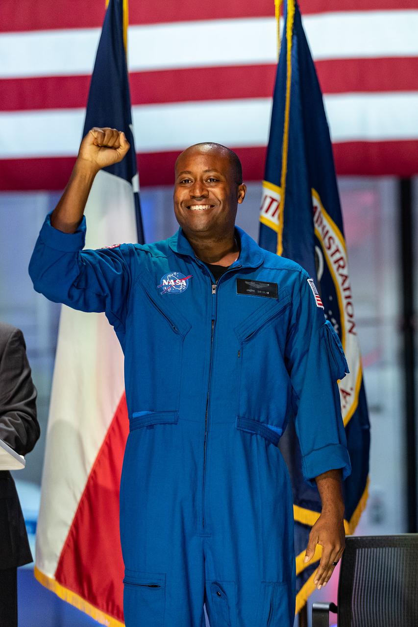 Photo Date: 2021-12-06 Subject:  NASA announced its 2021 astronaut candidate class on Dec. 6, 2021. The 10 candidates, pictured here in an event at Ellington Field near NASA’s Johnson Space Center in Houston are Nichole Ayers, Christopher Williams, Luke Delaney, Jessica Wittner, Anil Menon, Marcos Berríos, Jack Hathaway, Christina Birch, Deniz Burnham, and Andre Douglas.   NASA’s new astronaut candidates will begin about two years of training in January 2022, after which they could be assigned to missions performing research on the International Space Station, launching from American soil on spacecraft built by commercial companies, and launching on Artemis missions to the Moon on NASA’s new Orion spacecraft and Space Launch System rocket.  Location: Ellington Hangar 135 Photographer: James Blair