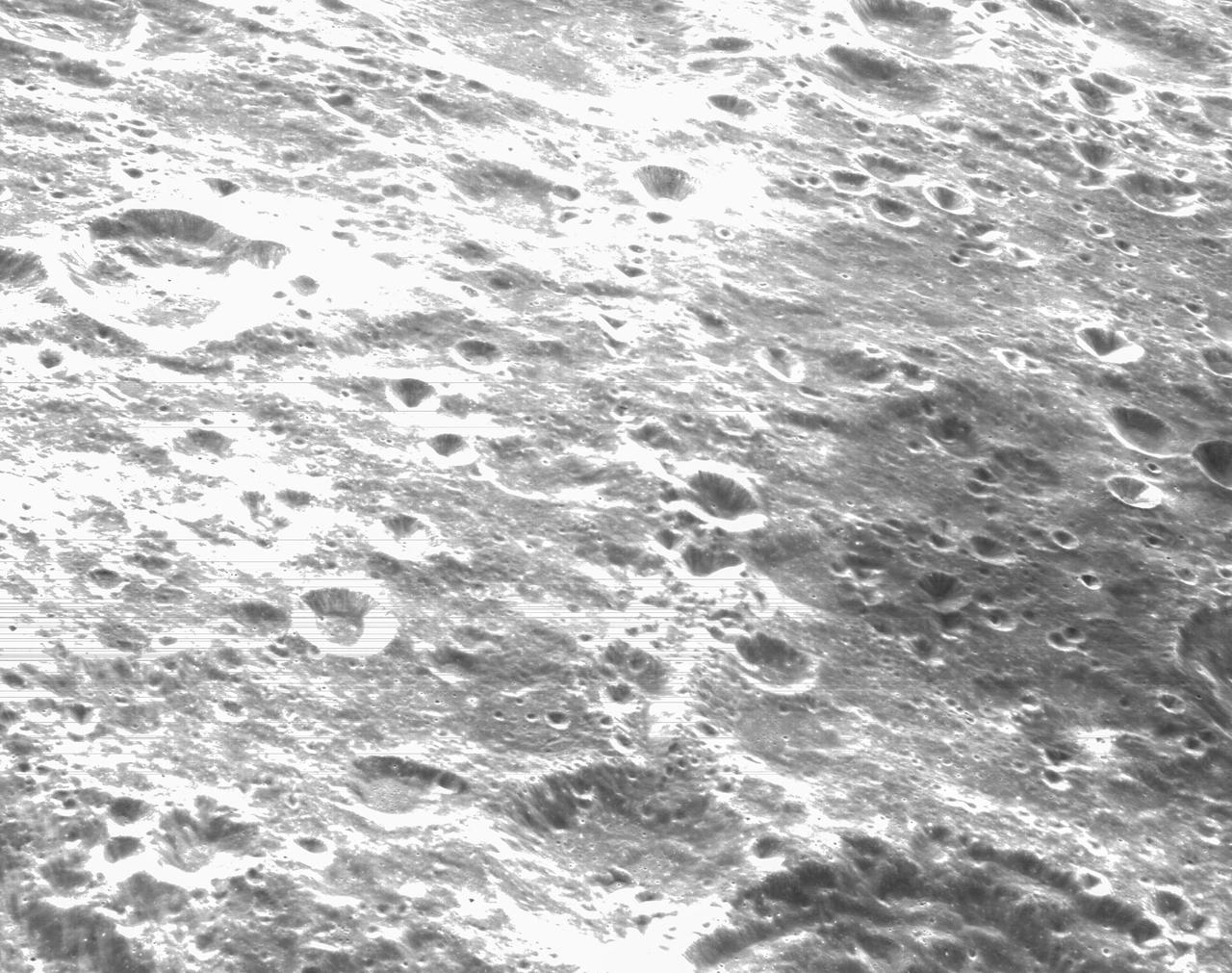 art001e000274 Nov. 21, 2022 -- On the sixth day of the Artemis I mission, Orion's optical navigation camera was commanded to take this black-and-white photo of the lunar surface. Orion uses the optical navigation camera to capture imagery of the Earth and the Moon at different phases and distances, providing an enhanced body of data to certify its effectiveness under different lighting conditions as a way to help orient the spacecraft on future missions with crew.