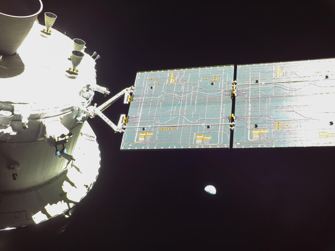 art001e001717 (Nov. 29, 2022) A camera on the tip of one of the Orion’s four solar arrays captured Earth when the spacecraft was 264,000 miles from our home planet on the Artemis I mission.