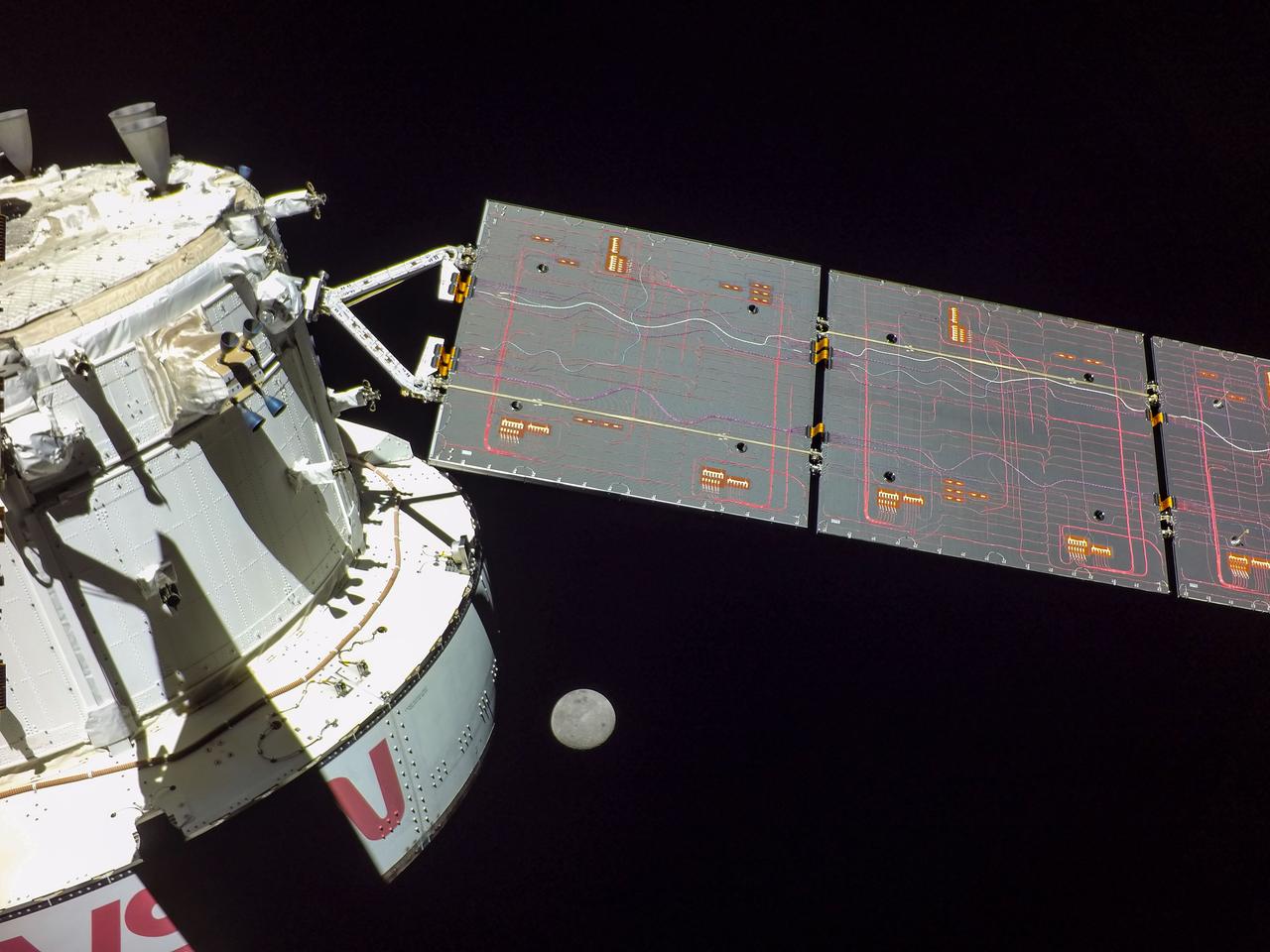 art001e001719  (Nov. 30, 2022) A camera mounted on the tip of one of Orion’s solar arrays captured the Moon as the spacecraft was in a distant lunar orbit.